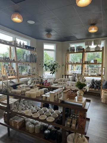 a room with lots of furniture and a large window