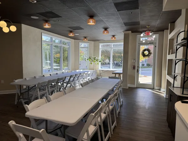 a view of a dining room with furniture window and outside view