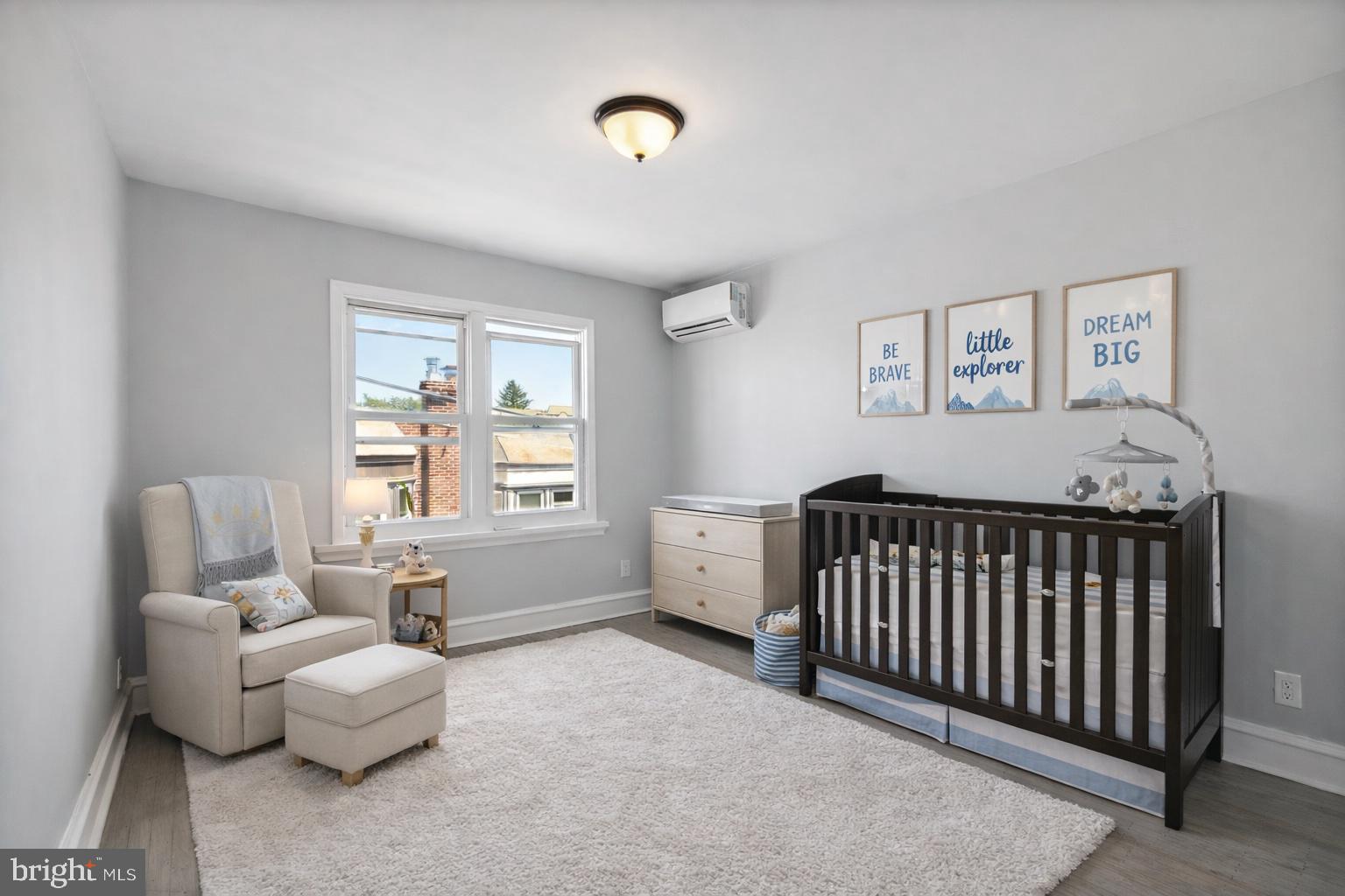 2414 77th Avenue Philadelphia, PA 19150 - Photo 14 of 25 a bedroom with furniture and a window