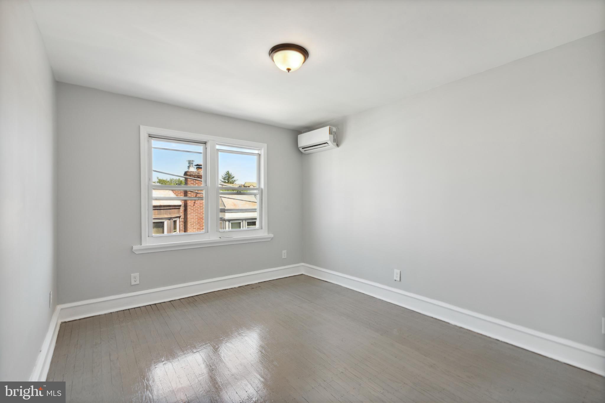 2414 77th Avenue Philadelphia, PA 19150 - Photo 15 of 25 an empty room with a window