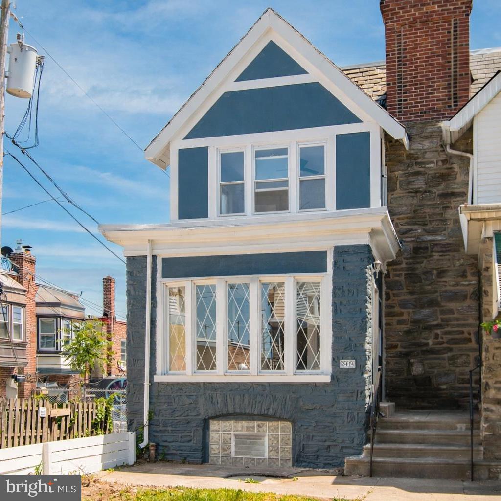 2414 77th Avenue Philadelphia, PA 19150 - Photo 23 of 25 a front view of a house with glass windows