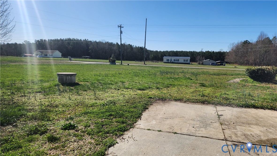 24816 Sawmill Road Carson, VA 23830 - Photo 5 of 24 Expansive green space featuring a concrete pad and