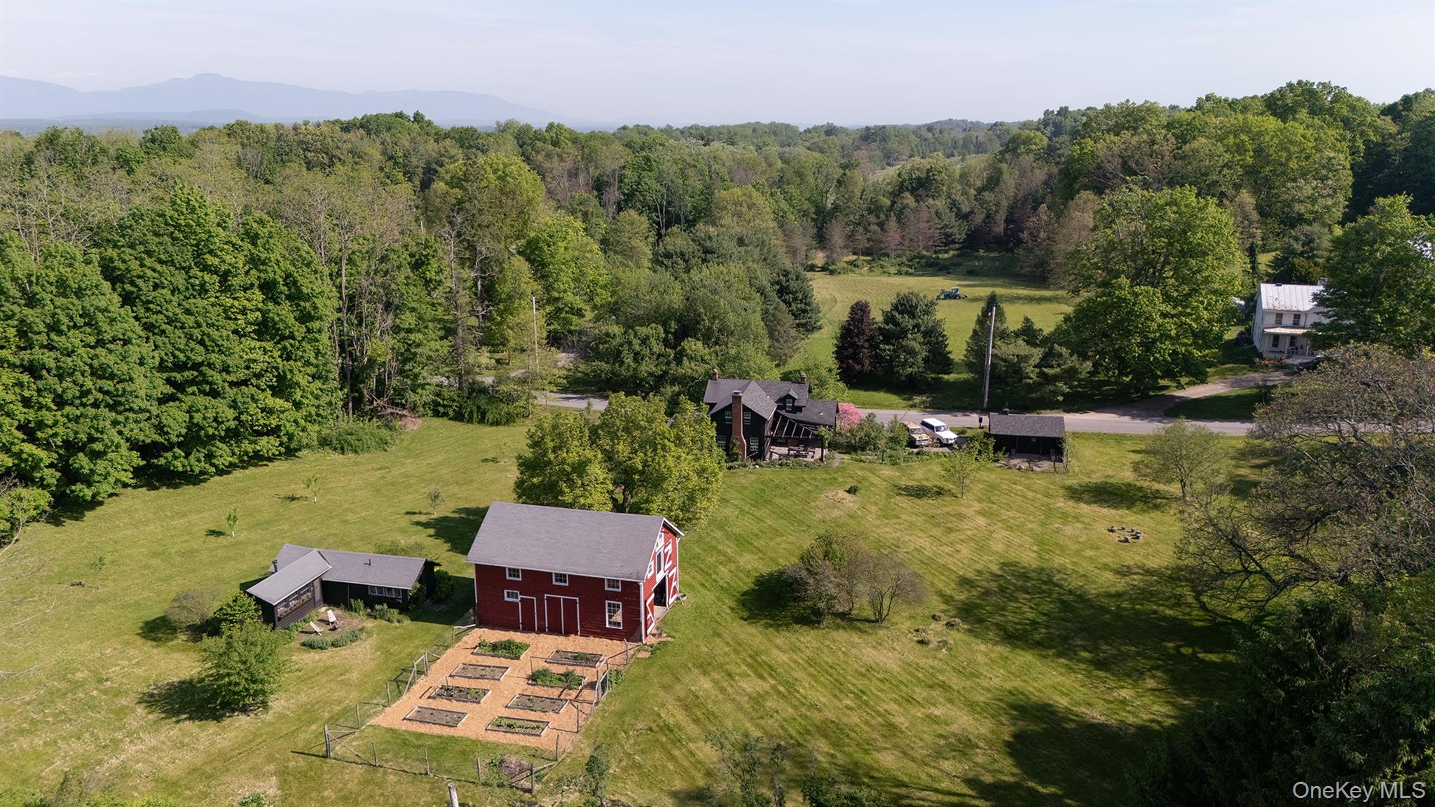 77 Upper Hook Road Rhinebeck, NY 12572 - Photo 47 of 48 an aerial view of a house with a garden