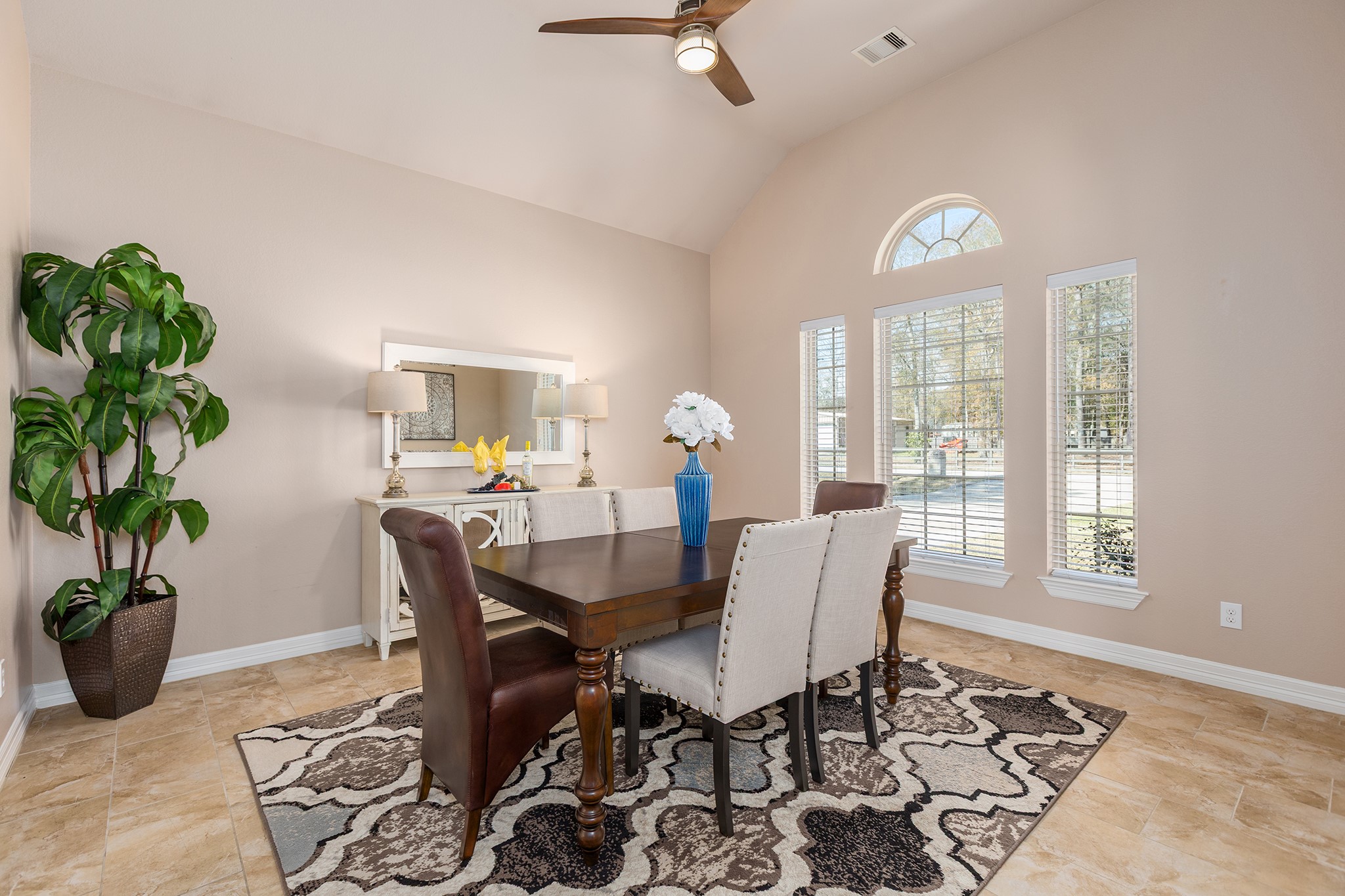 27688 Rio Blanco Drive Splendora, TX 77372 - Photo 7 of 50 a dining room with furniture potted plants and wooden floor