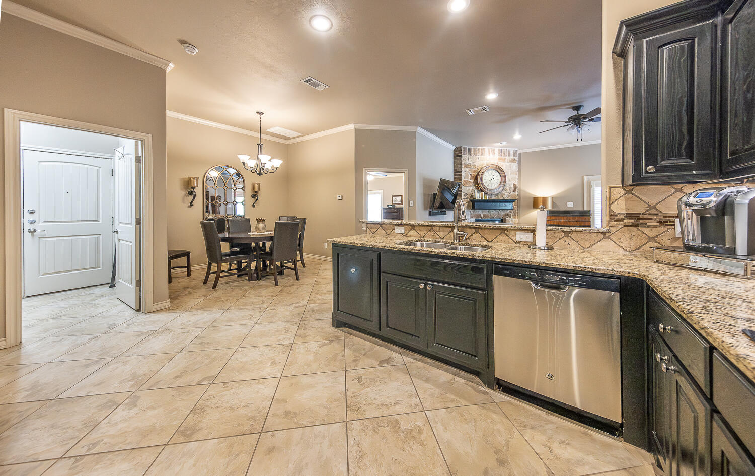 4402 108th Street, Unit 10 Lubbock, TX 79424 - Photo 8 of 21 a kitchen with a sink and cabinets