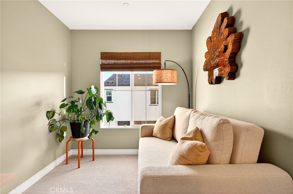 35165 Rangpur Lane Fallbrook, CA 92028 - Photo 19 of 42 a living room with furniture and a potted plant