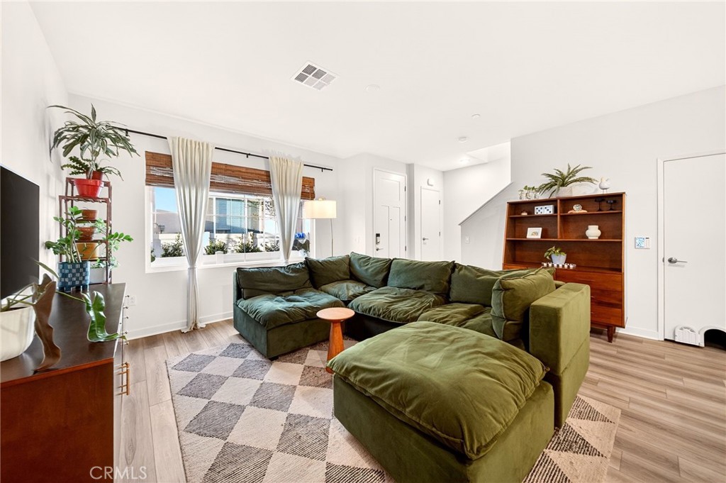 35165 Rangpur Lane Fallbrook, CA 92028 - Photo 6 of 42 a living room with furniture and a flat screen tv
