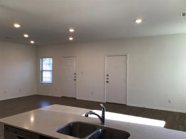a view of a workspace with furniture