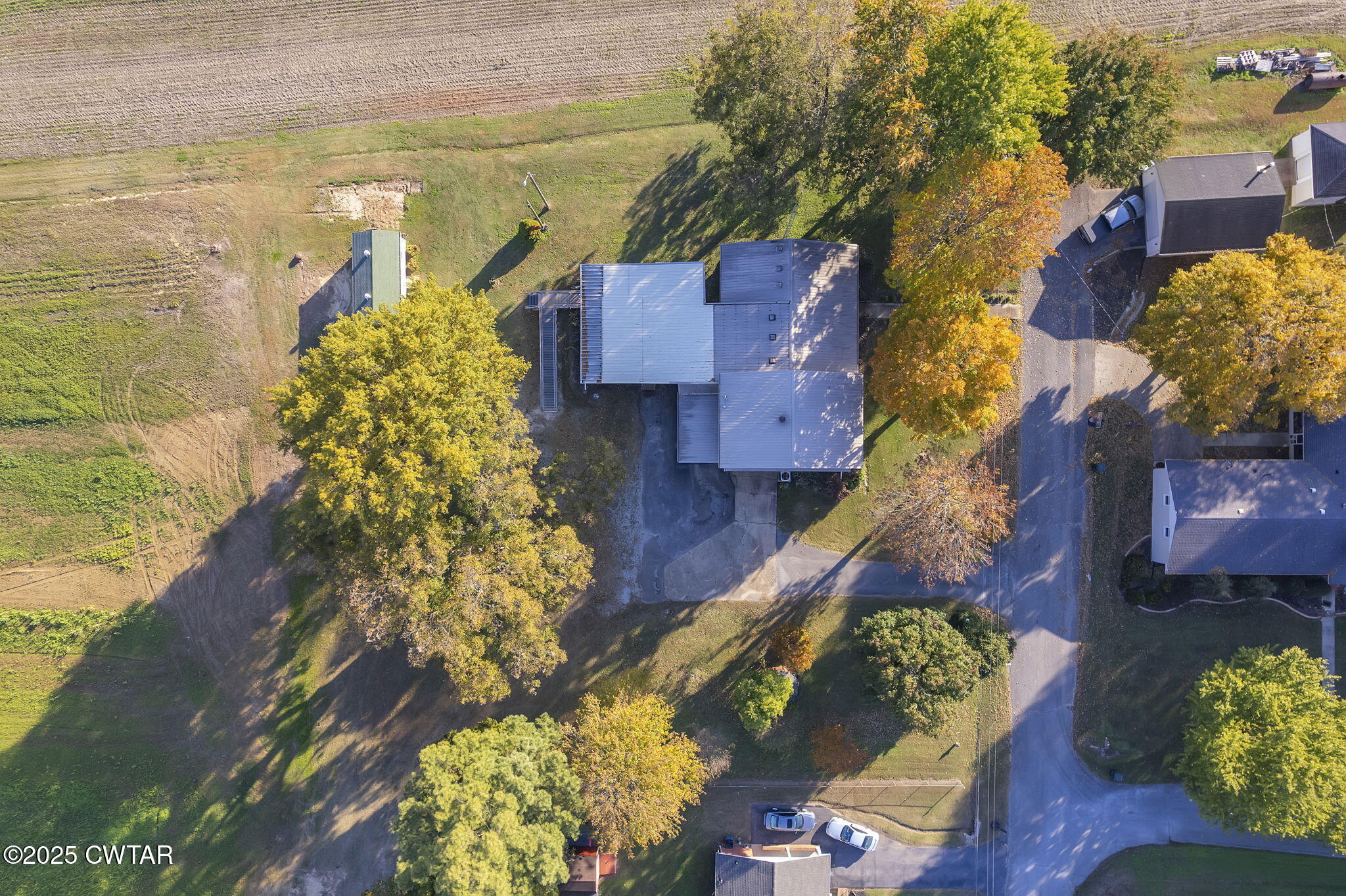 404 Callis Drive Rutherford, TN 38369 - Photo 14 of 39 an aerial view of a house with a yard and lake view