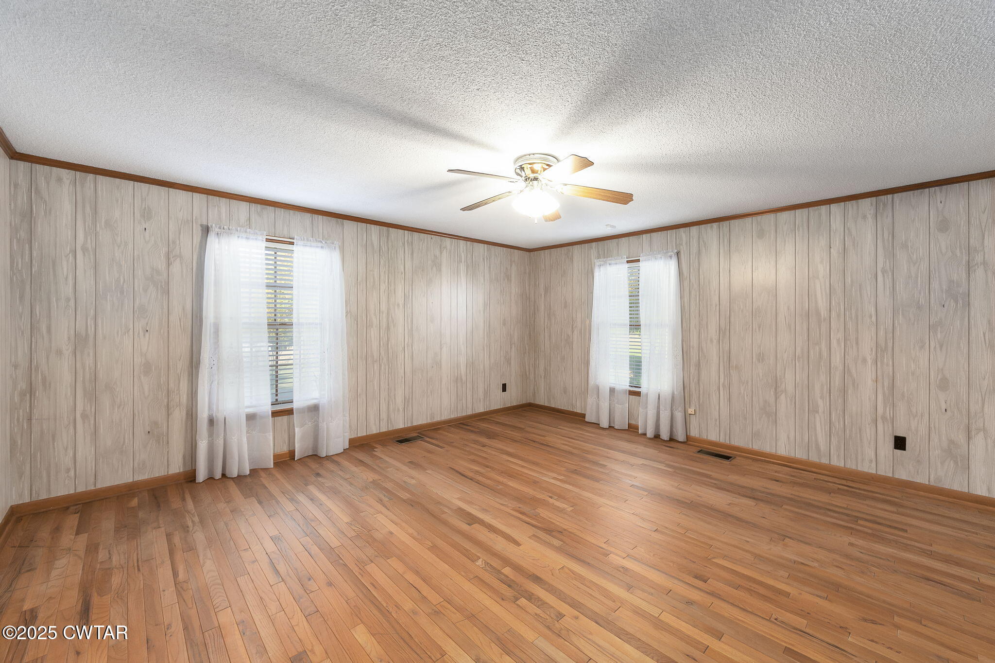 404 Callis Drive Rutherford, TN 38369 - Photo 23 of 39 a view of an empty room with a window and wooden floor