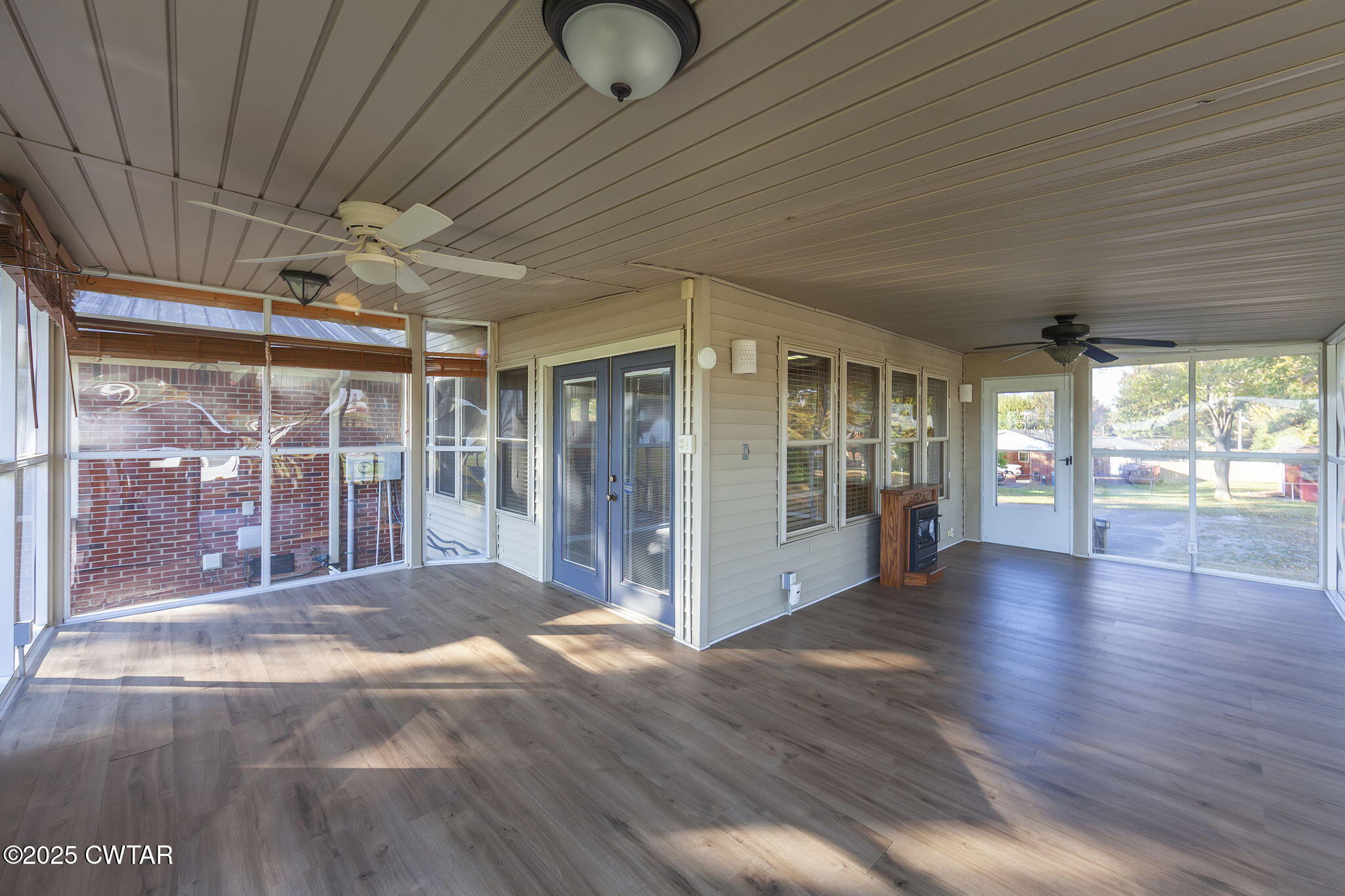 404 Callis Drive Rutherford, TN 38369 - Photo 36 of 39 a view of empty room with wooden floor and fan