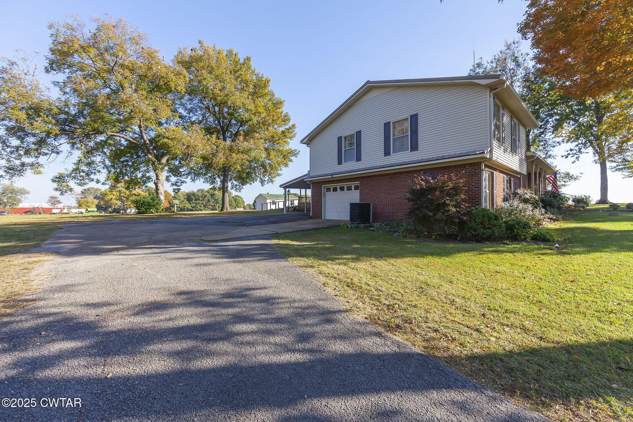 404 Callis Drive Rutherford, TN 38369 - Photo 4 of 39 a front view of a house with garden