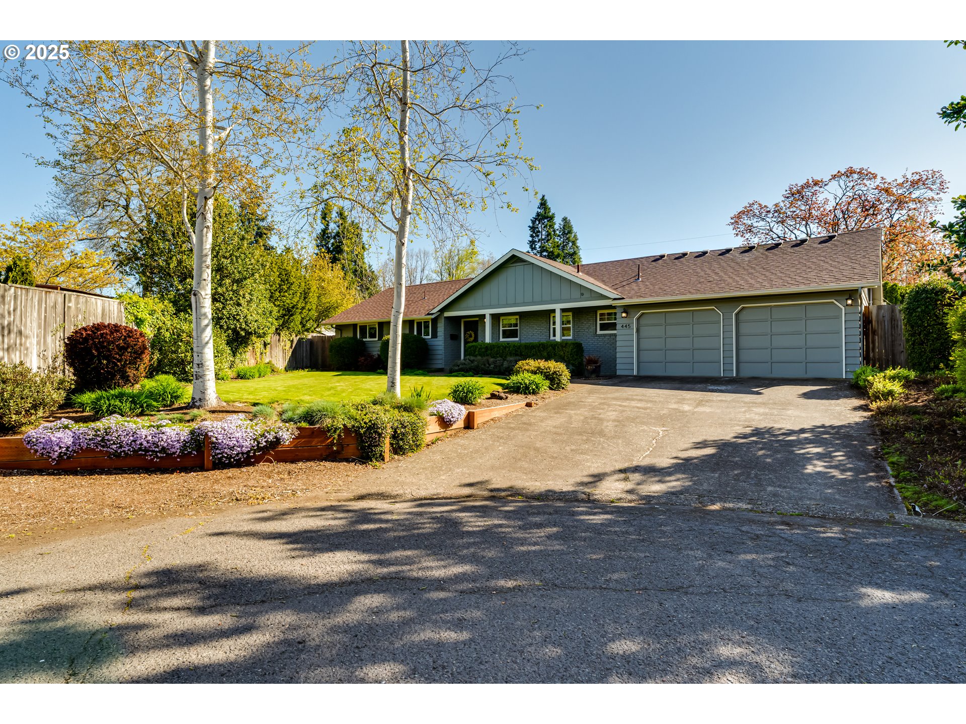 445 Hazel Court Eugene, OR 97401 - Photo 1 of 40 a view of a house with a yard and potted plants