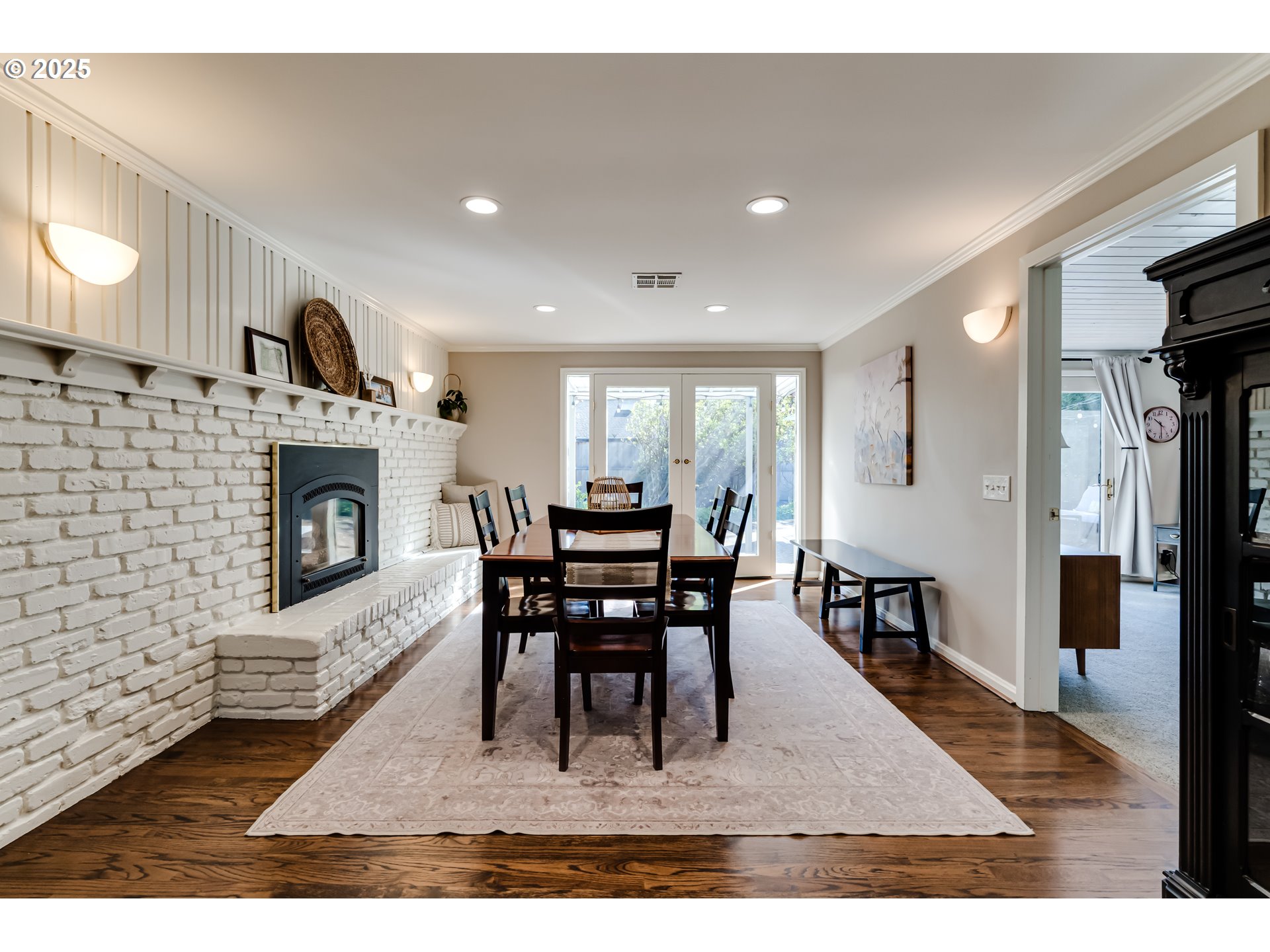 445 Hazel Court Eugene, OR 97401 - Photo 11 of 40 a view of a dining room with furniture and wooden floor