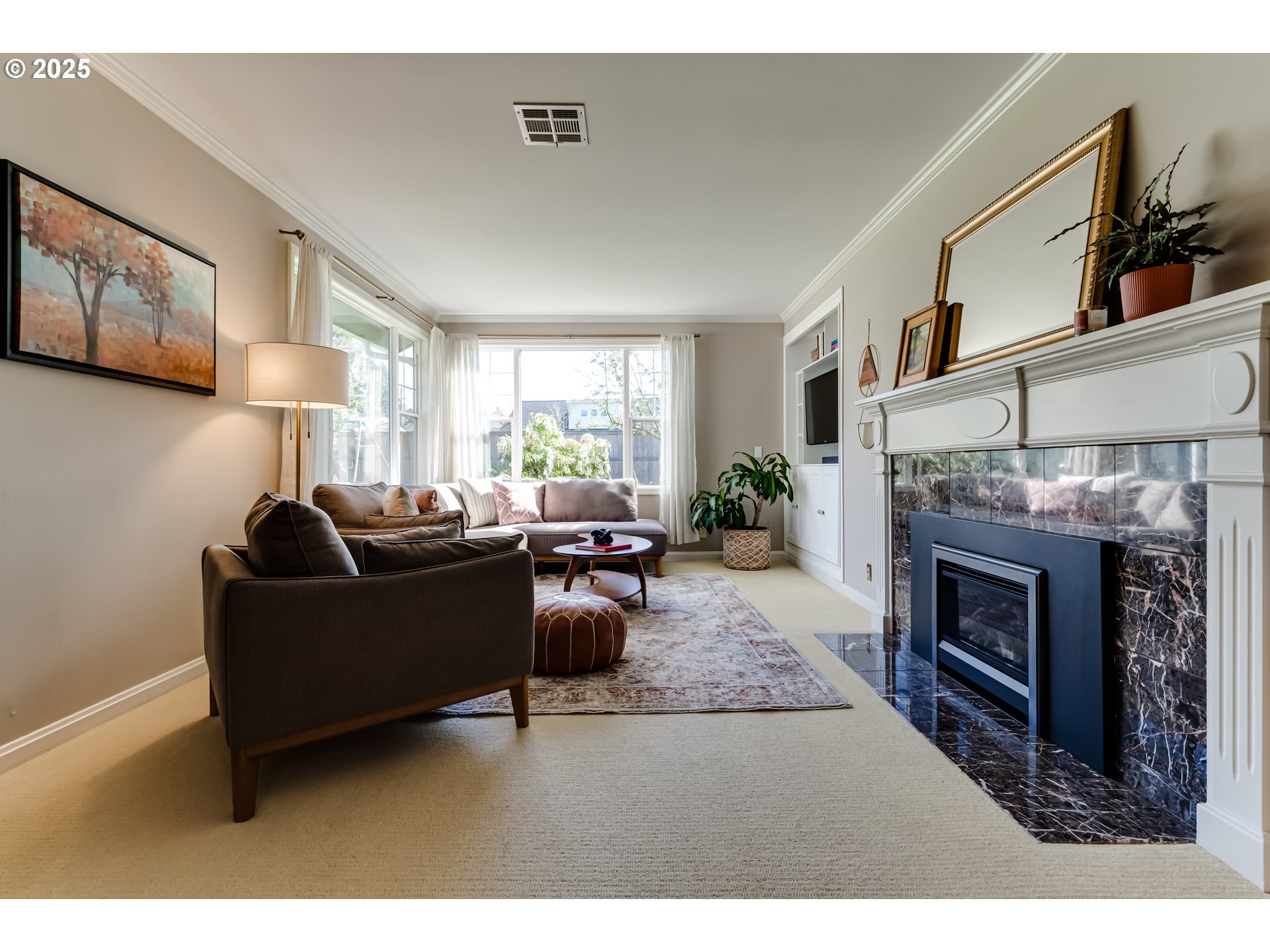445 Hazel Court Eugene, OR 97401 - Photo 13 of 40 a living room with furniture a fireplace and a large window