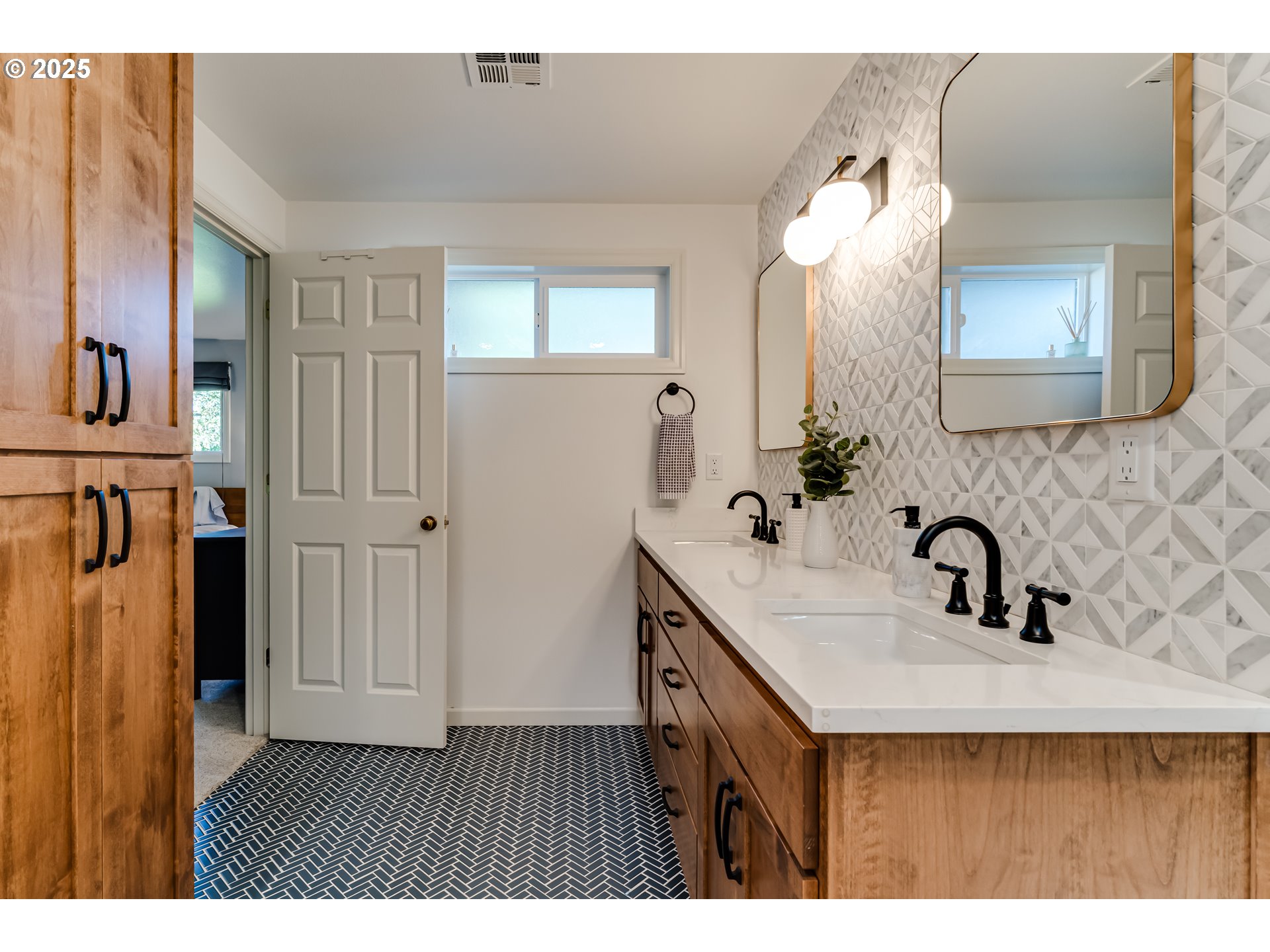 445 Hazel Court Eugene, OR 97401 - Photo 21 of 40 a bathroom with a sink and a mirror