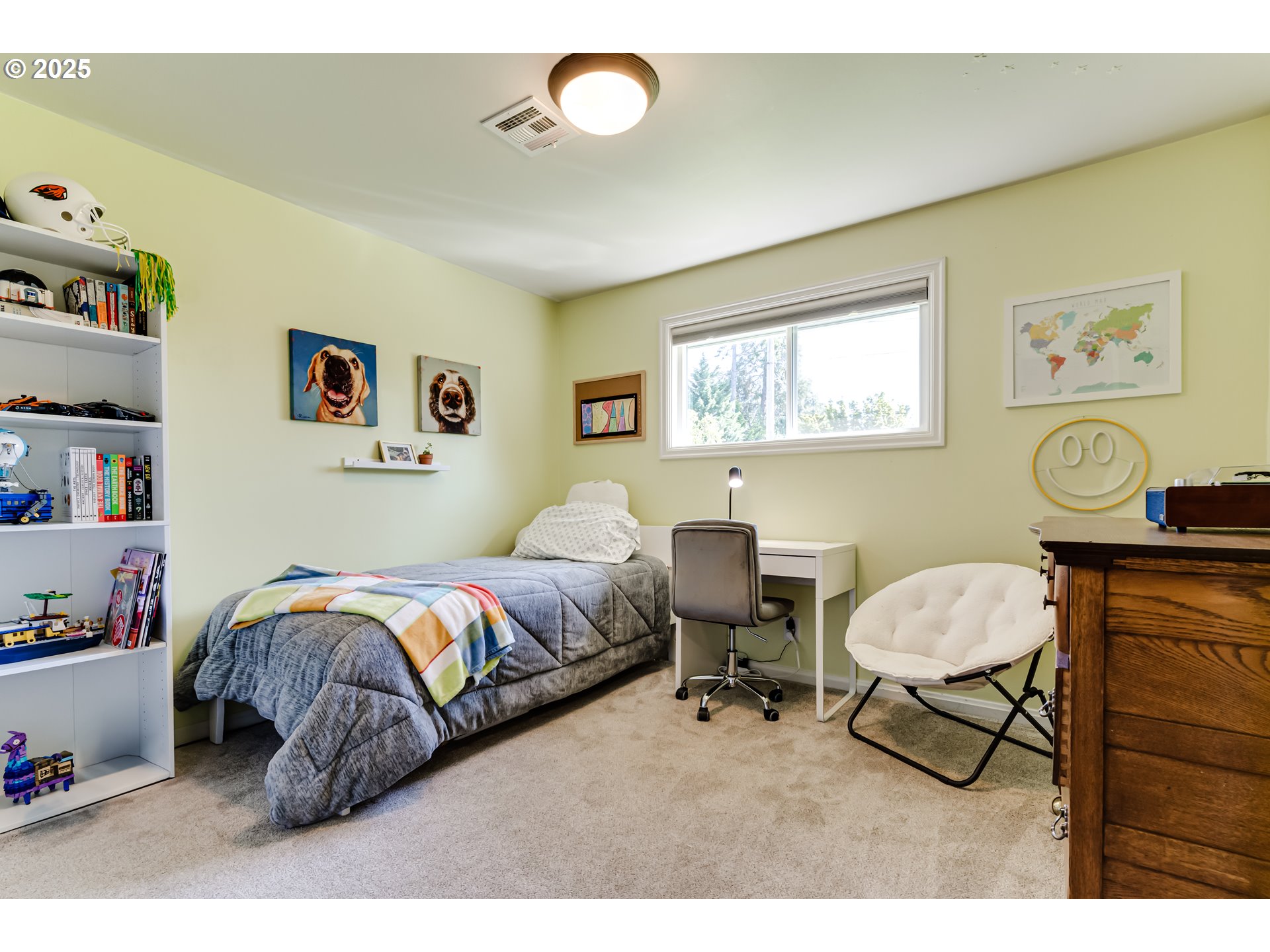 445 Hazel Court Eugene, OR 97401 - Photo 27 of 40 a bedroom with a bed and a chandelier