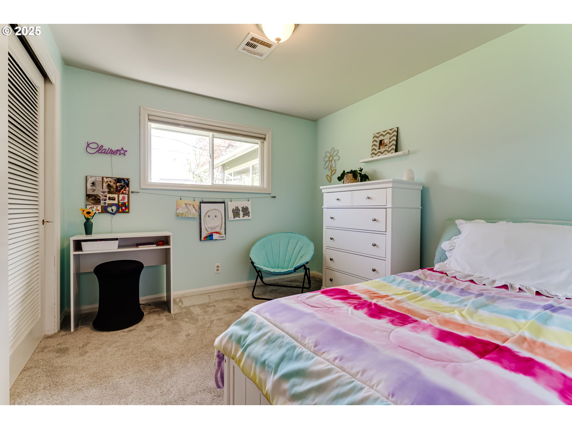 445 Hazel Court Eugene, OR 97401 - Photo 28 of 40 a bedroom with a bed and a dresser