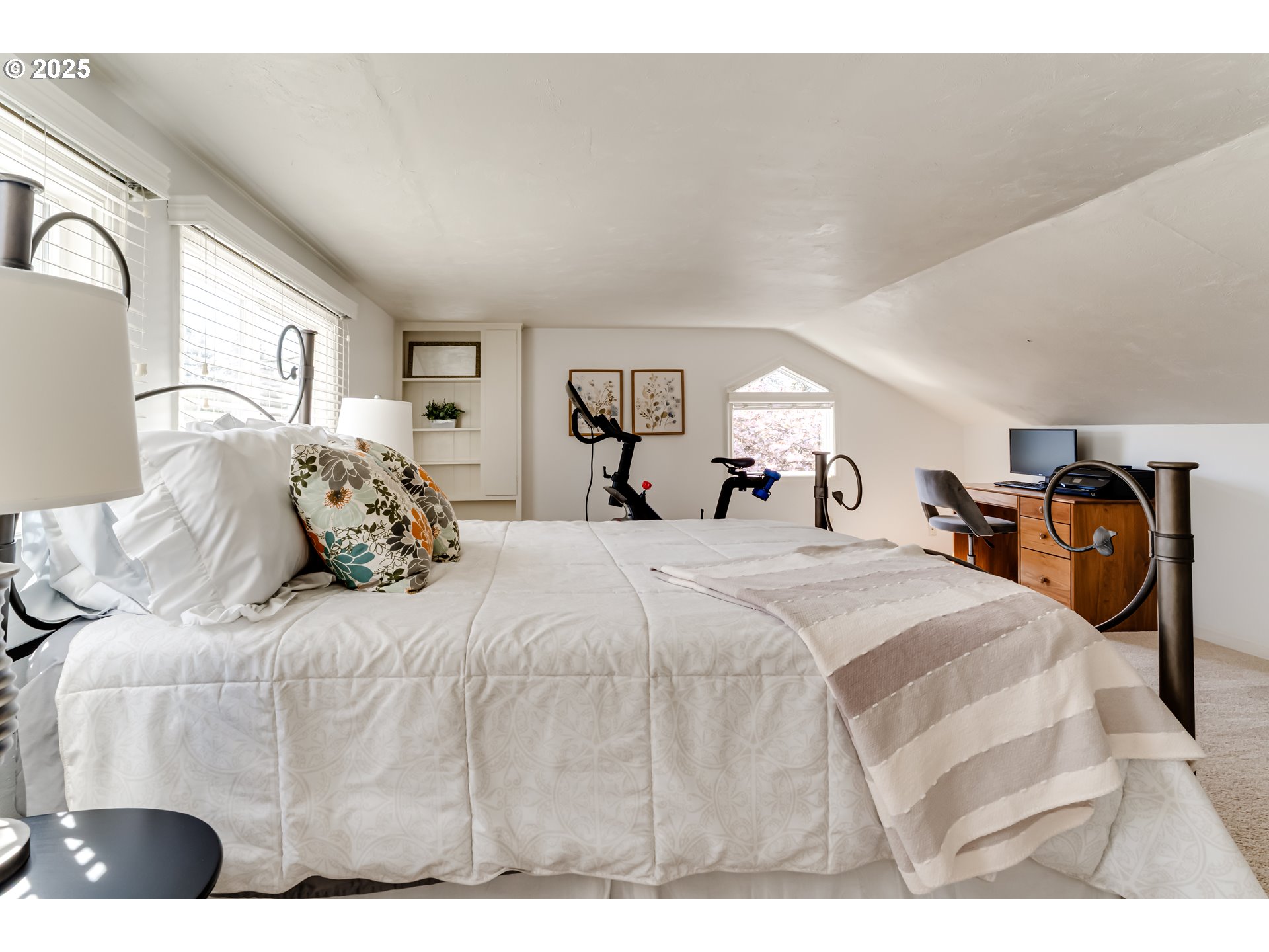 445 Hazel Court Eugene, OR 97401 - Photo 29 of 40 a large white bed in a white room