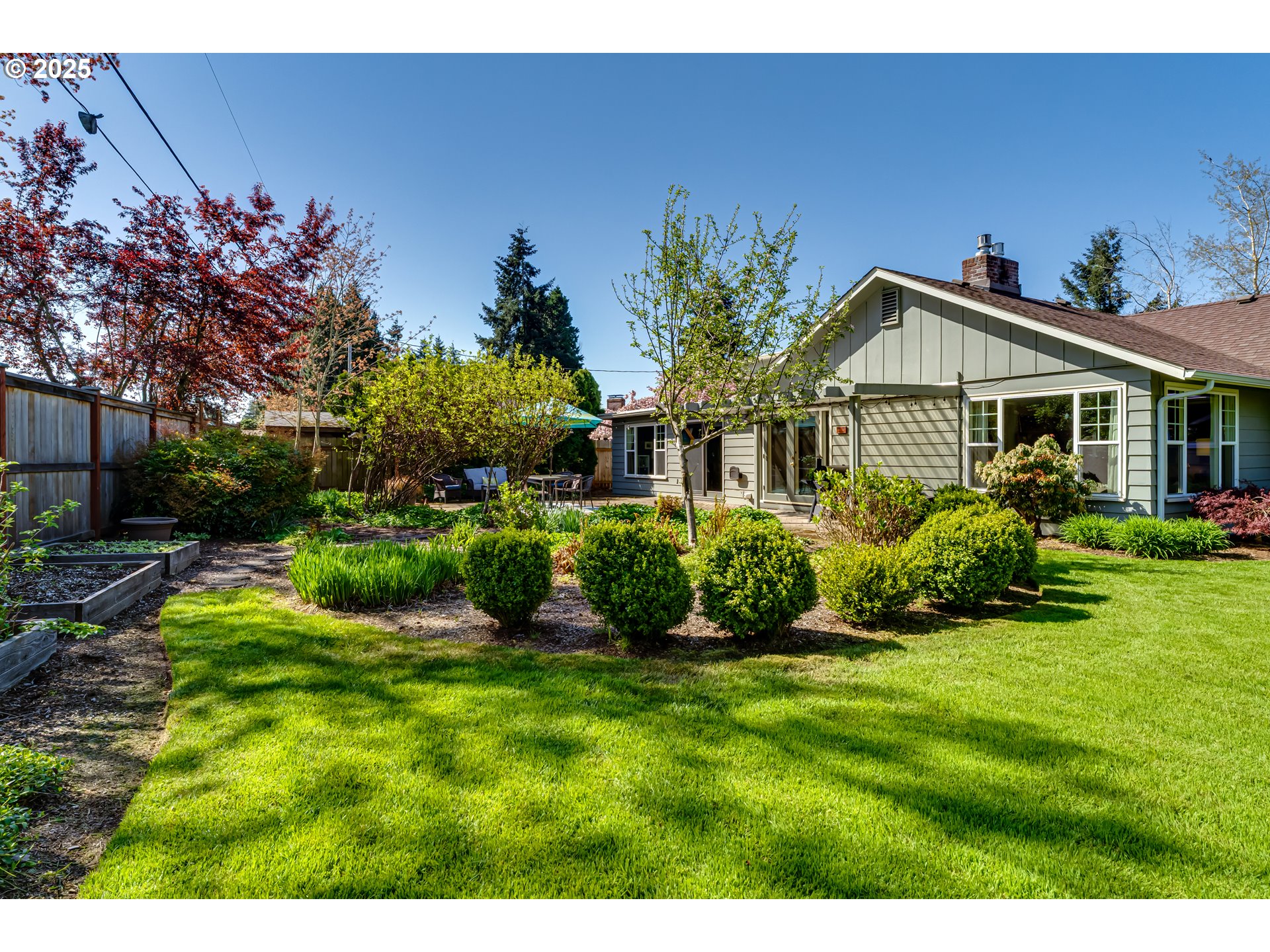 445 Hazel Court Eugene, OR 97401 - Photo 33 of 40 a front view of a house with a yard