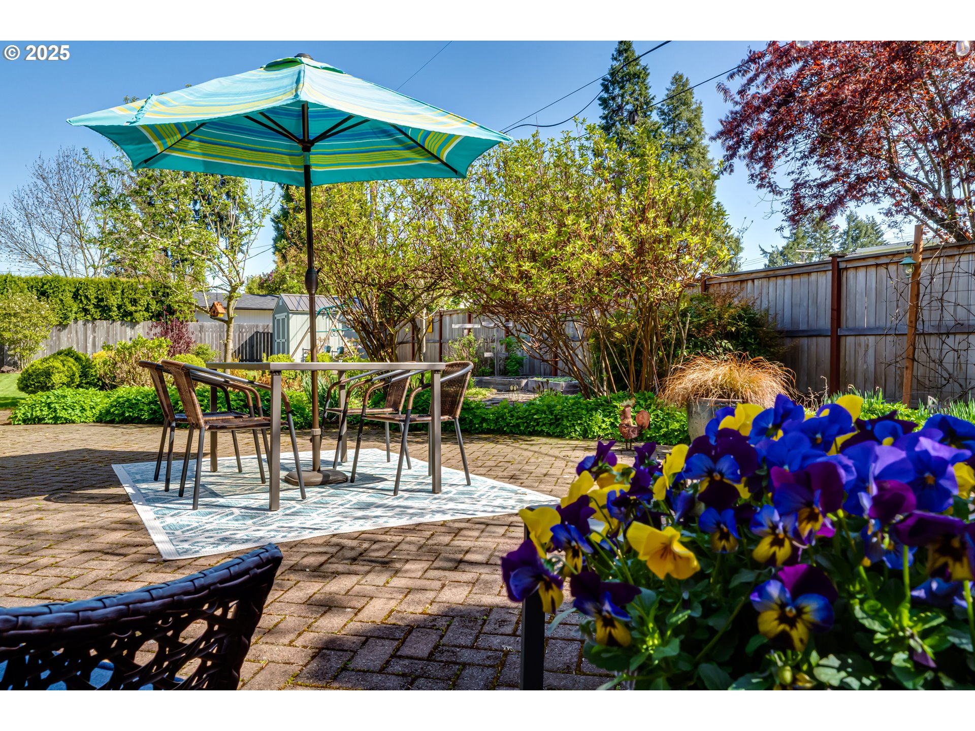 445 Hazel Court Eugene, OR 97401 - Photo 35 of 40 a view of a porch with furniture and umbrella