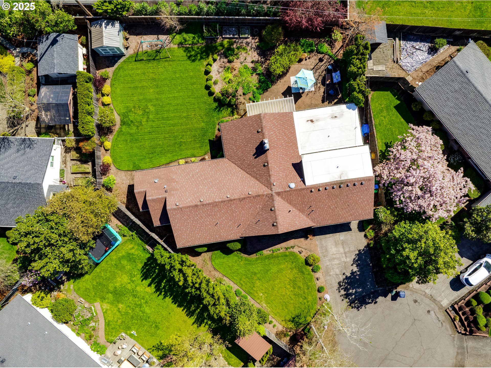445 Hazel Court Eugene, OR 97401 - Photo 39 of 40 an aerial view of a house with a garden and plants