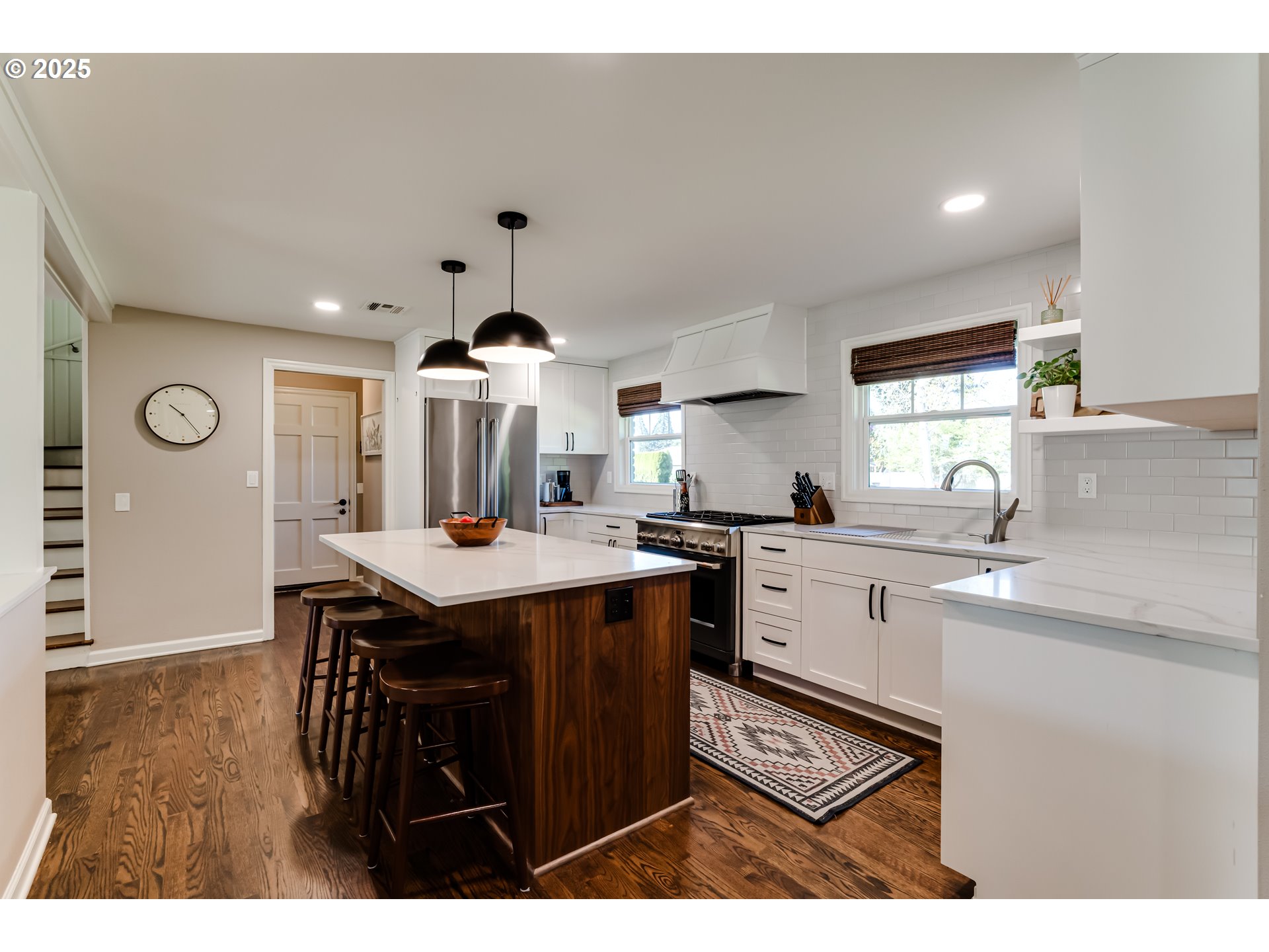 445 Hazel Court Eugene, OR 97401 - Photo 5 of 40 a kitchen with a sink a stove a refrigerator and cabinets