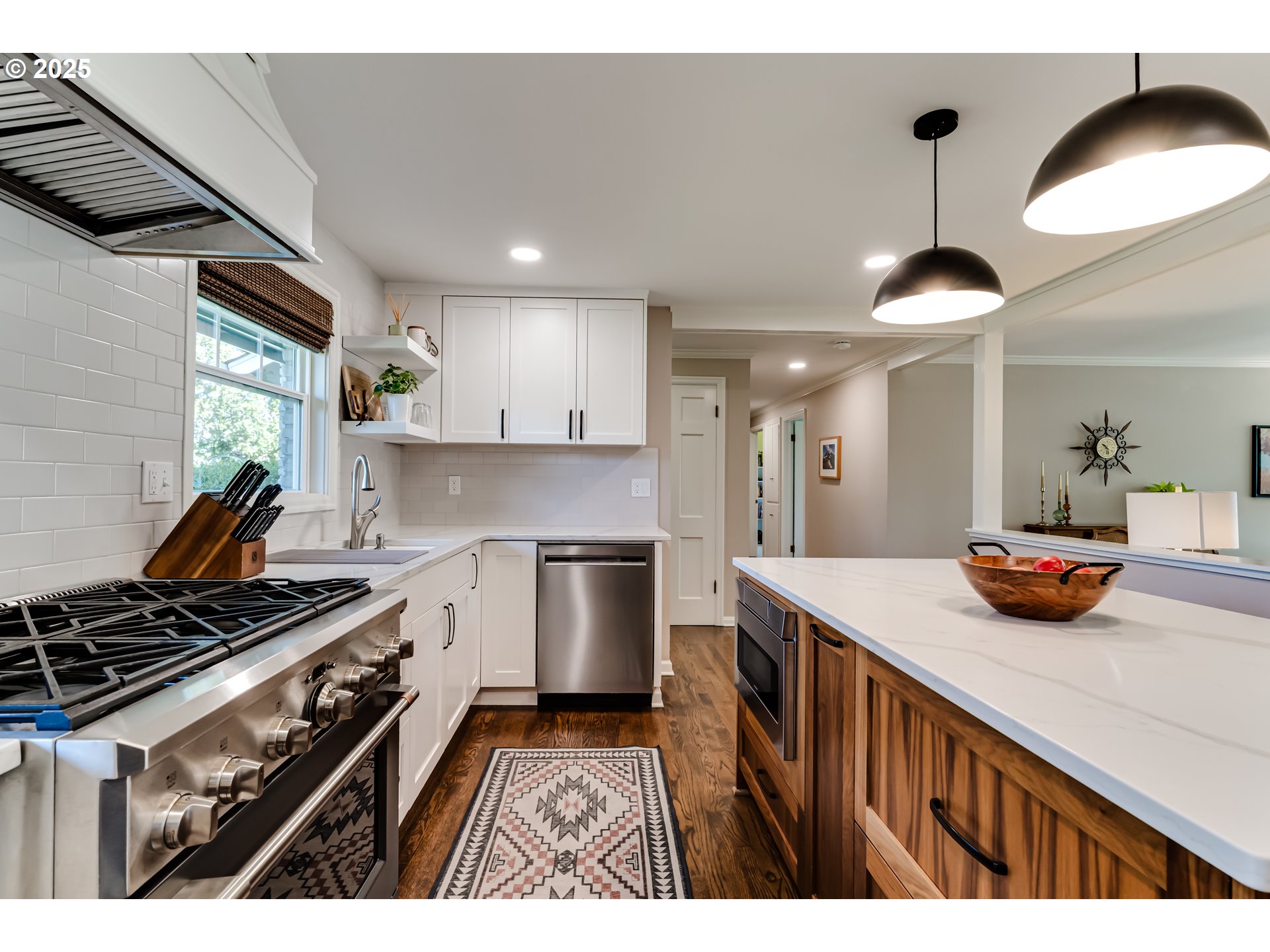 445 Hazel Court Eugene, OR 97401 - Photo 7 of 40 a kitchen that has a sink and a stove in it