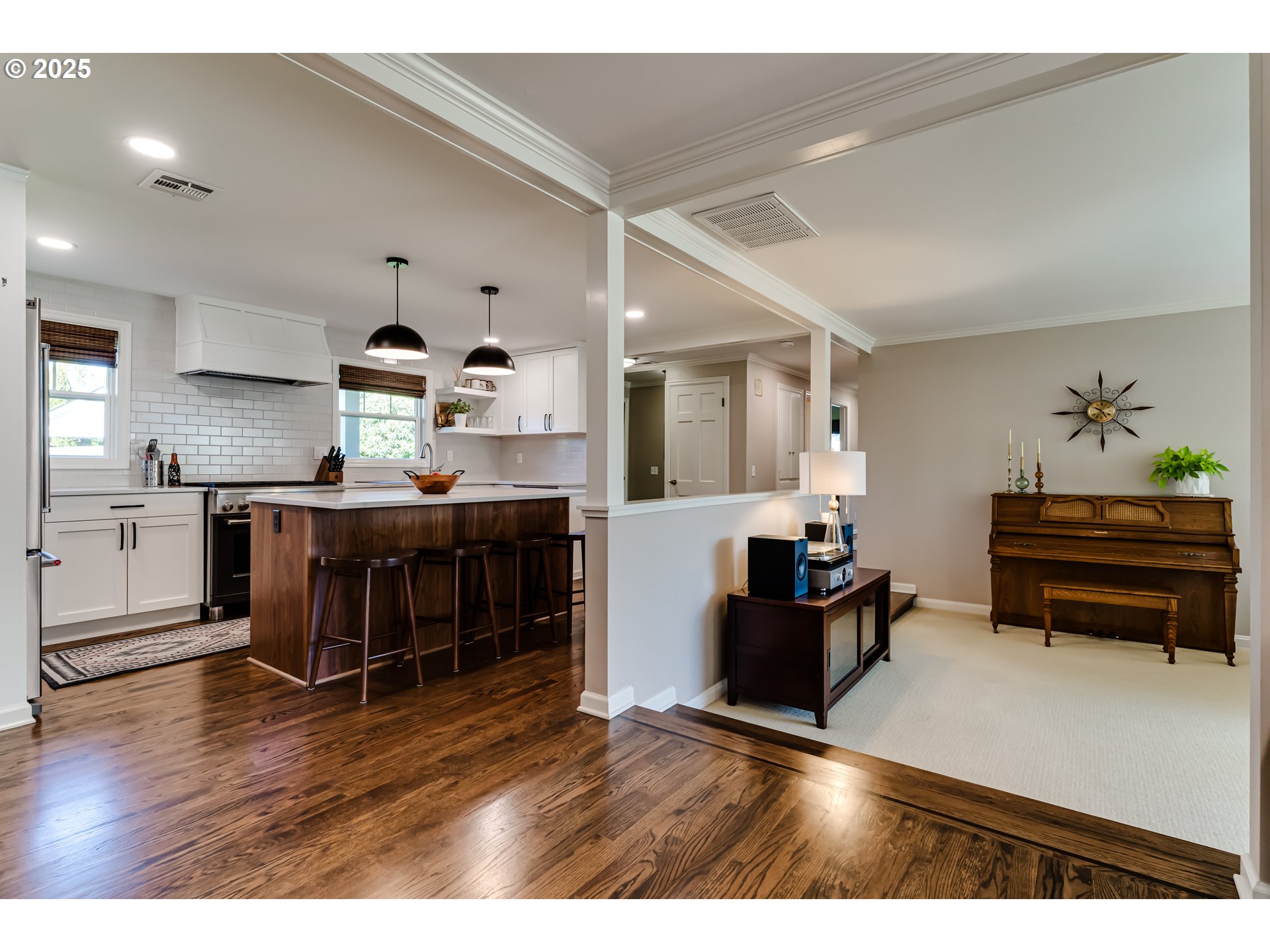 445 Hazel Court Eugene, OR 97401 - Photo 9 of 40 a living room with furniture and a wooden floor