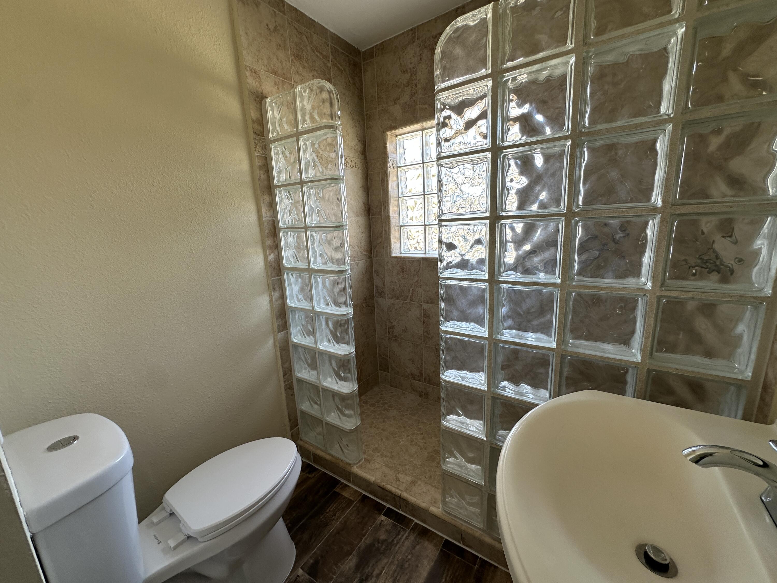 12164 B Street Trona, CA 93562 - Photo 17 of 41 a bathroom with a sink toilet and shower
