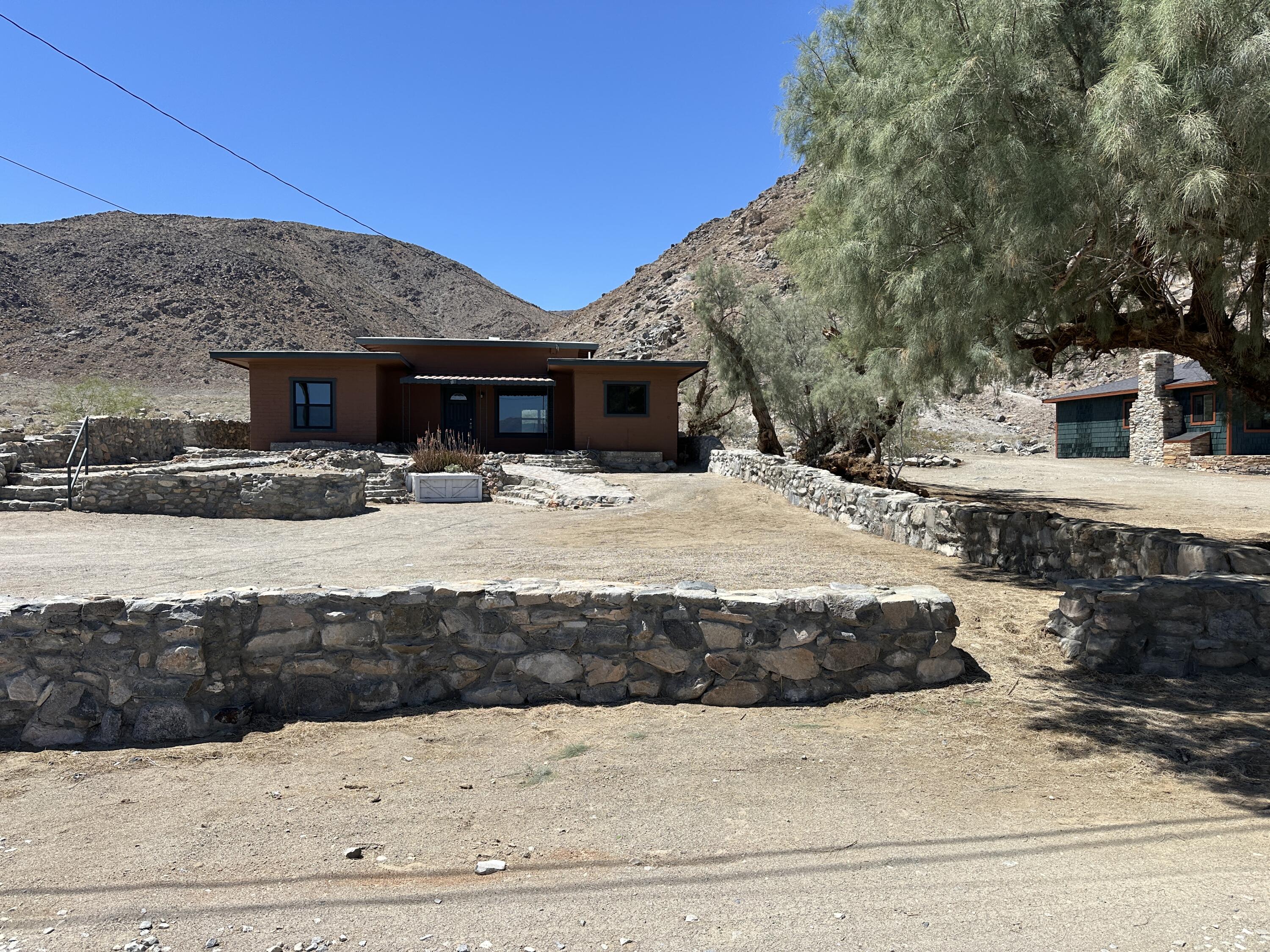 12164 B Street Trona, CA 93562 - Photo 24 of 41 a view of a house with snow on the road
