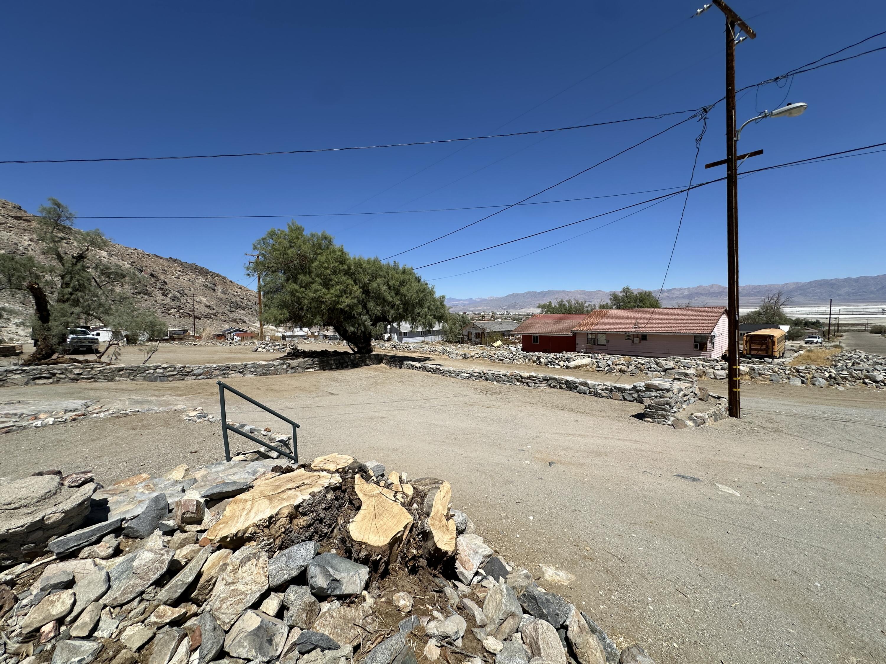 12164 B Street Trona, CA 93562 - Photo 26 of 41 a view of a road with a yard