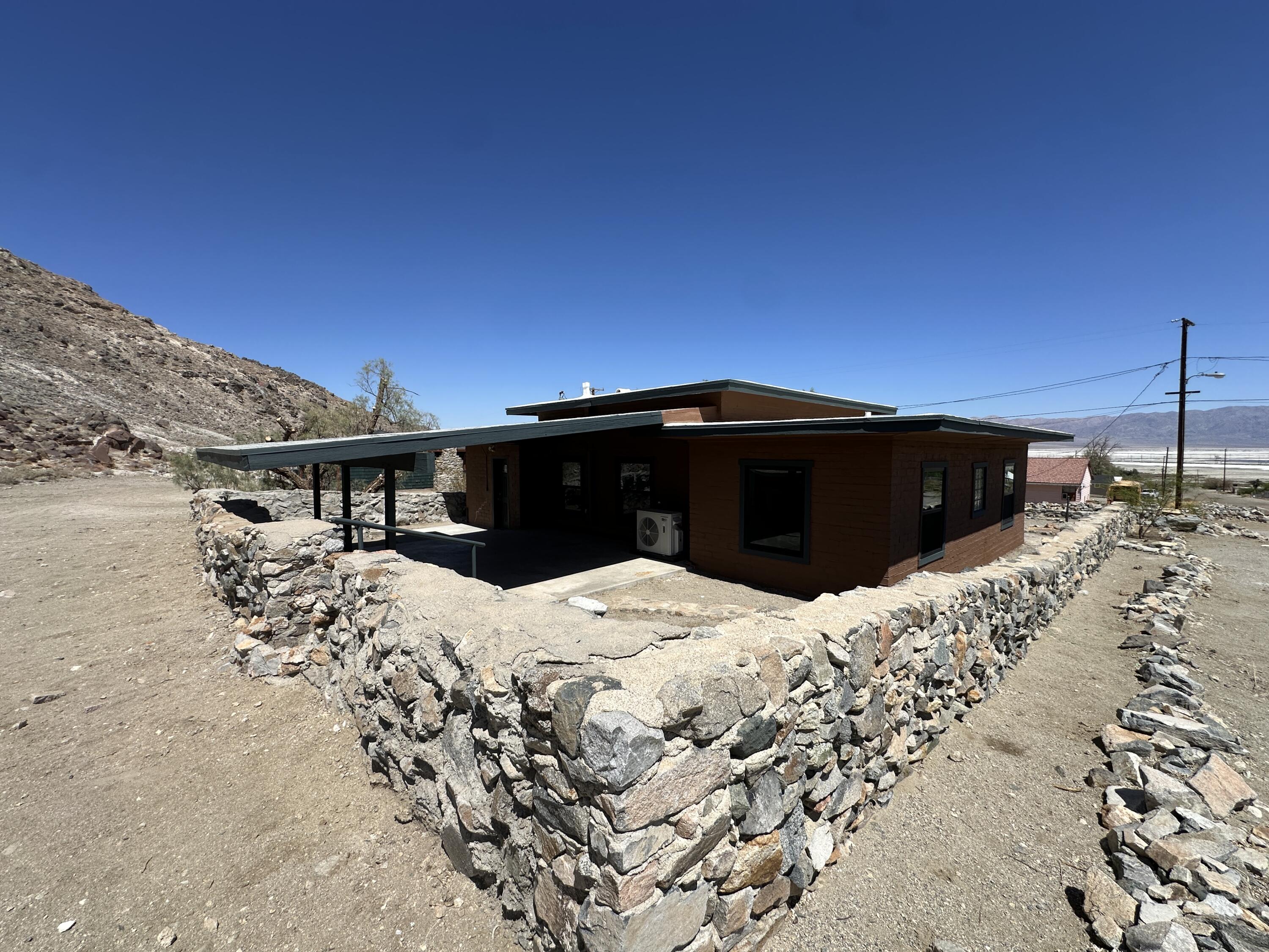 12164 B Street Trona, CA 93562 - Photo 29 of 41 a view of a house with a yard