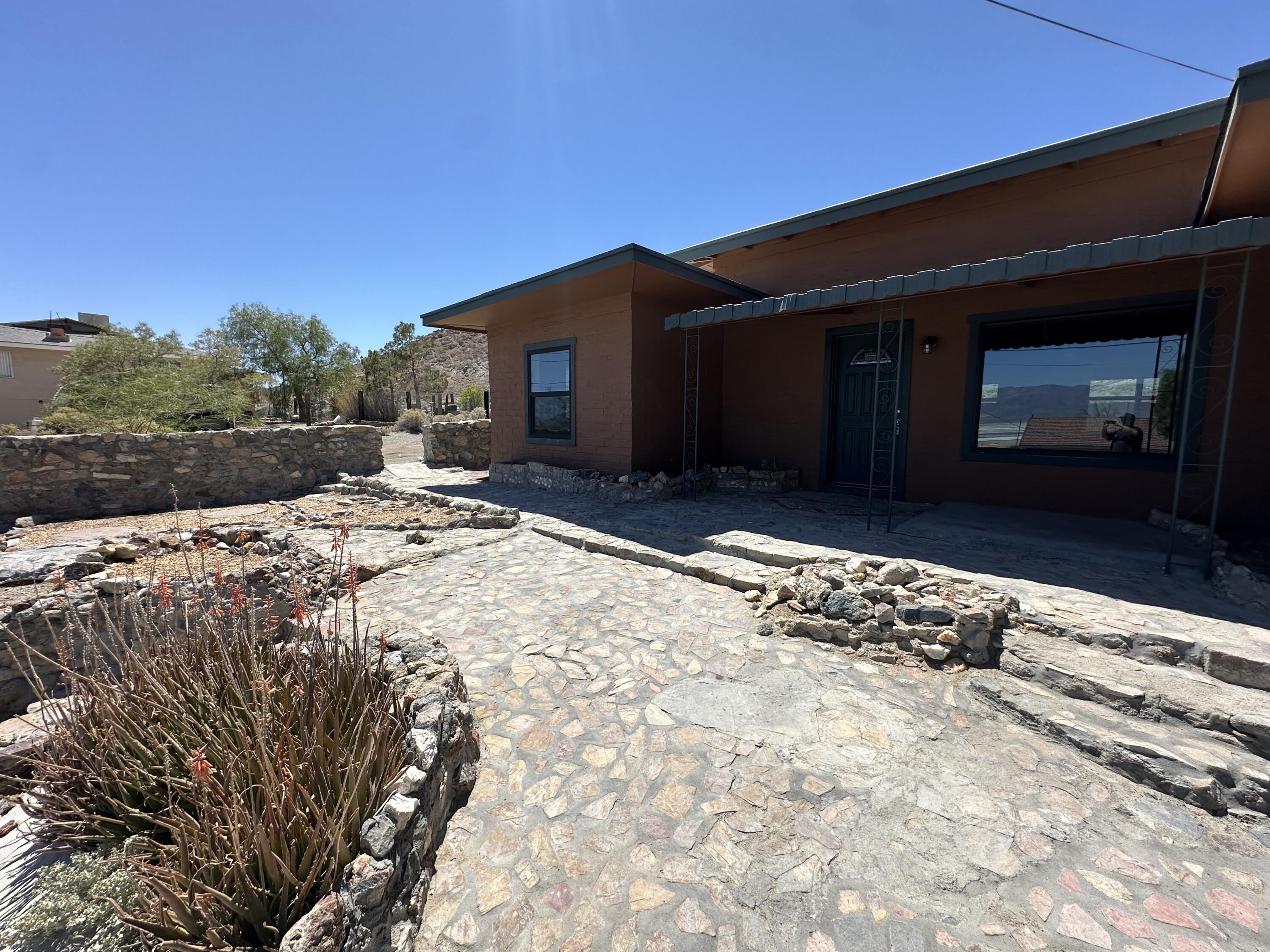 12164 B Street Trona, CA 93562 - Photo 35 of 41 a front view of a house with a yard