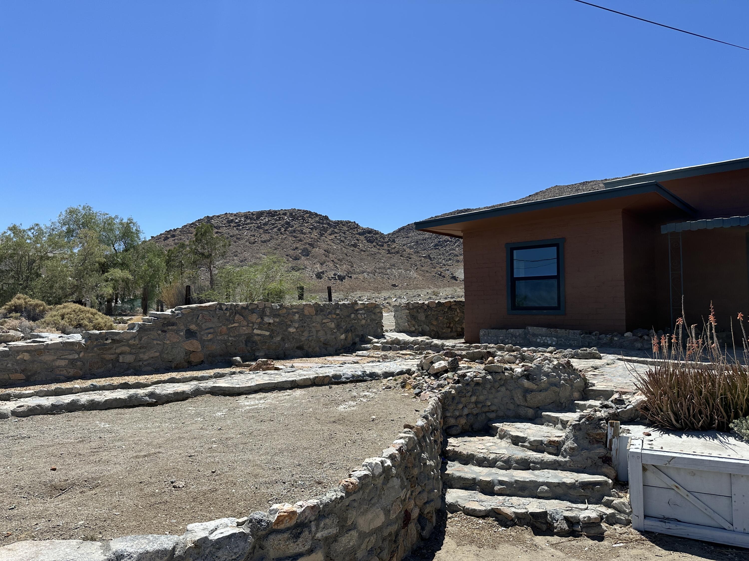 12164 B Street Trona, CA 93562 - Photo 39 of 41 a view of a house with a yard