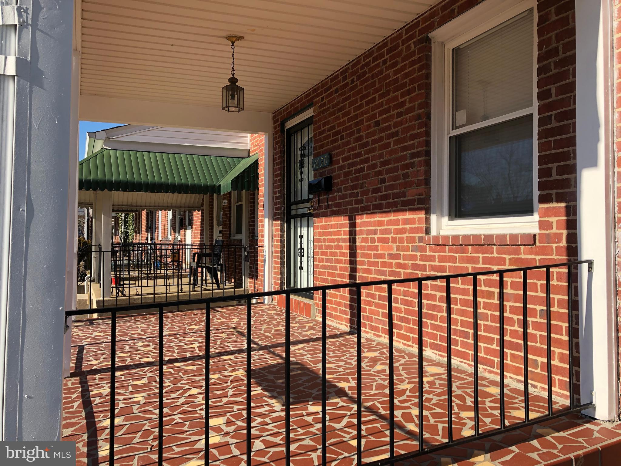 1650 Gleneagle Road Baltimore, MD 21239 - Photo 2 of 31 Relax on you front porch