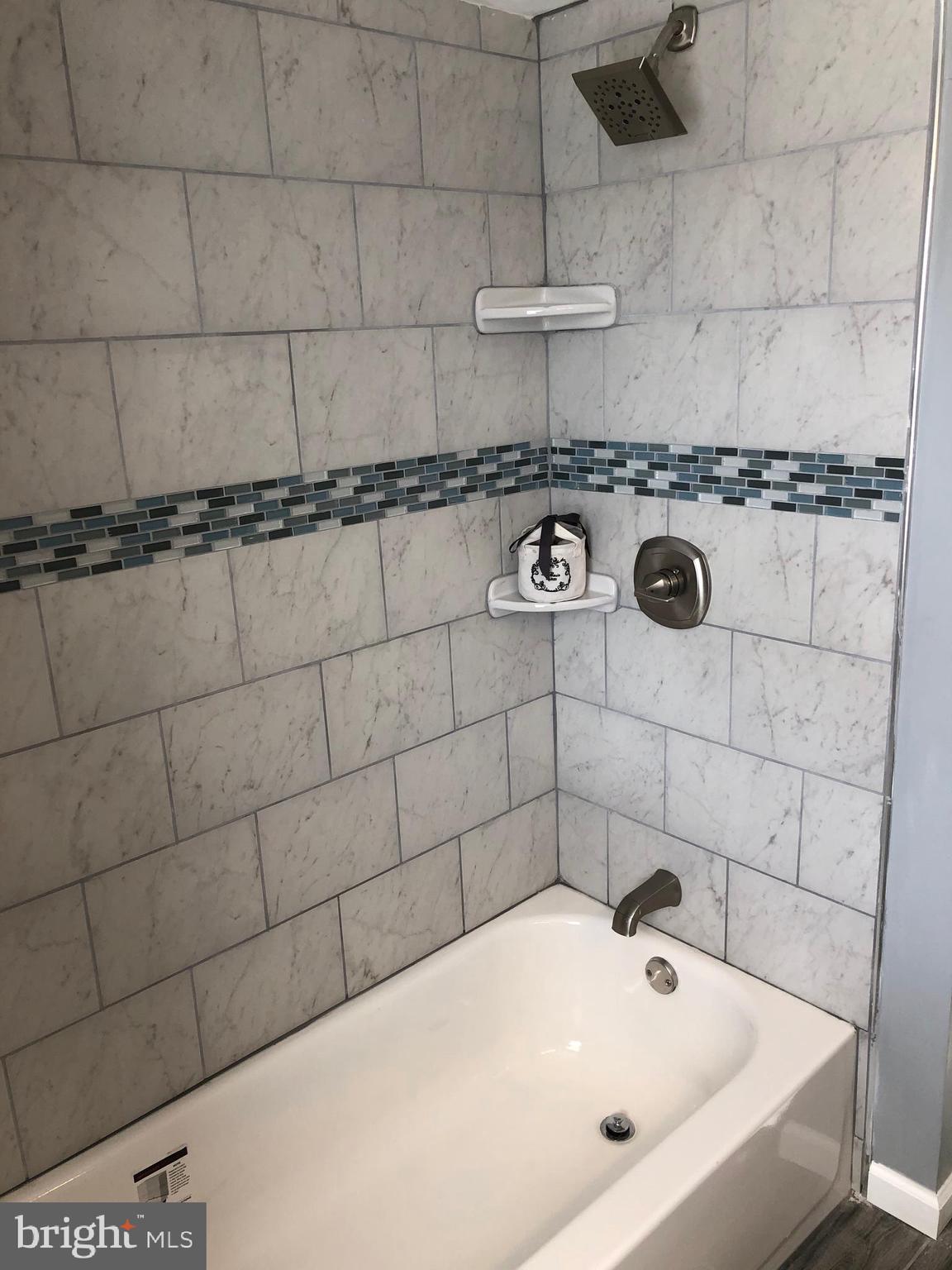 1650 Gleneagle Road Baltimore, MD 21239 - Photo 18 of 31 Custom tilework
