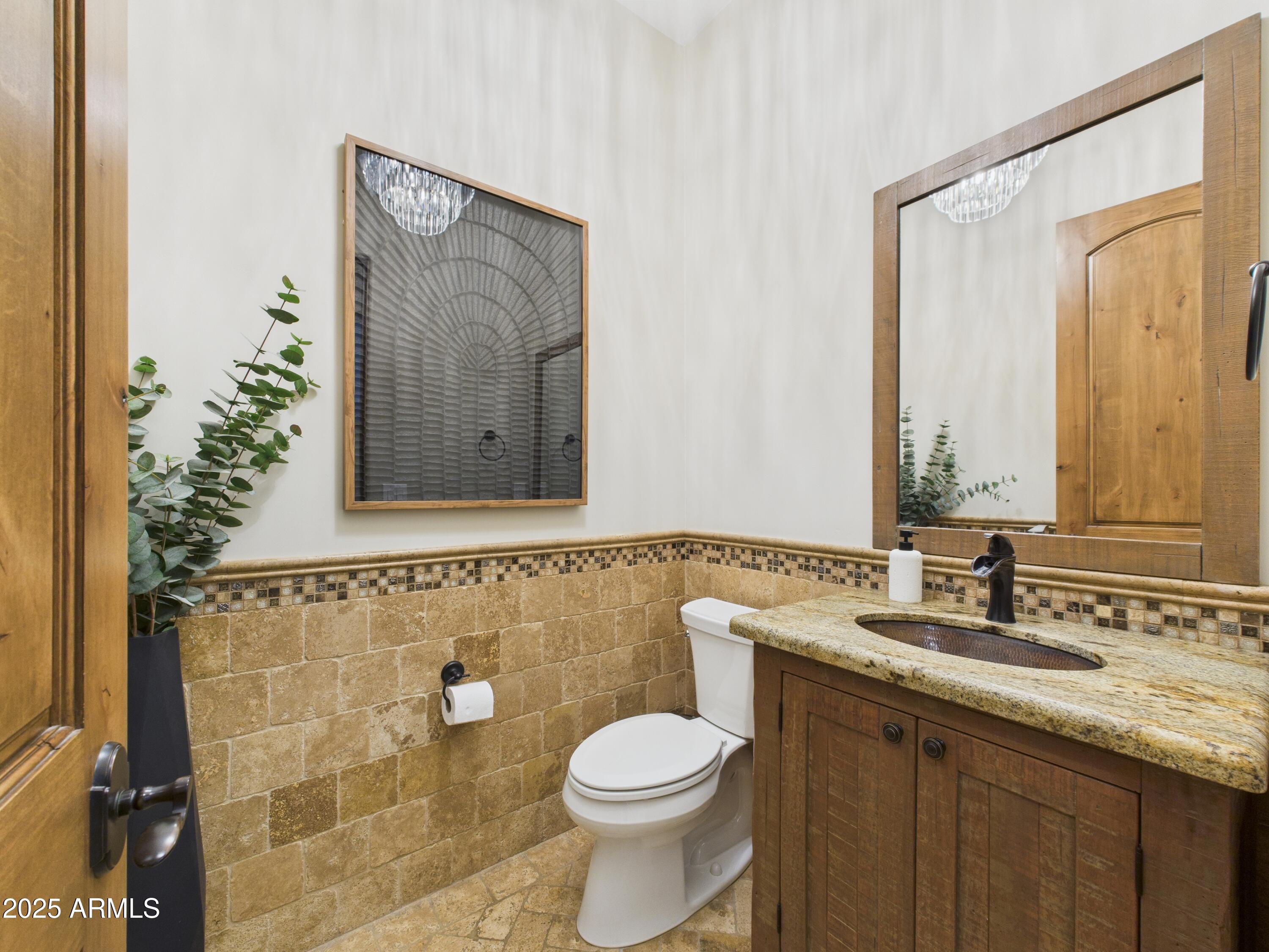806 West Desert Ranch Road Phoenix, AZ 85086 - Photo 29 of 36 a bathroom with a granite countertop sink toilet and shower