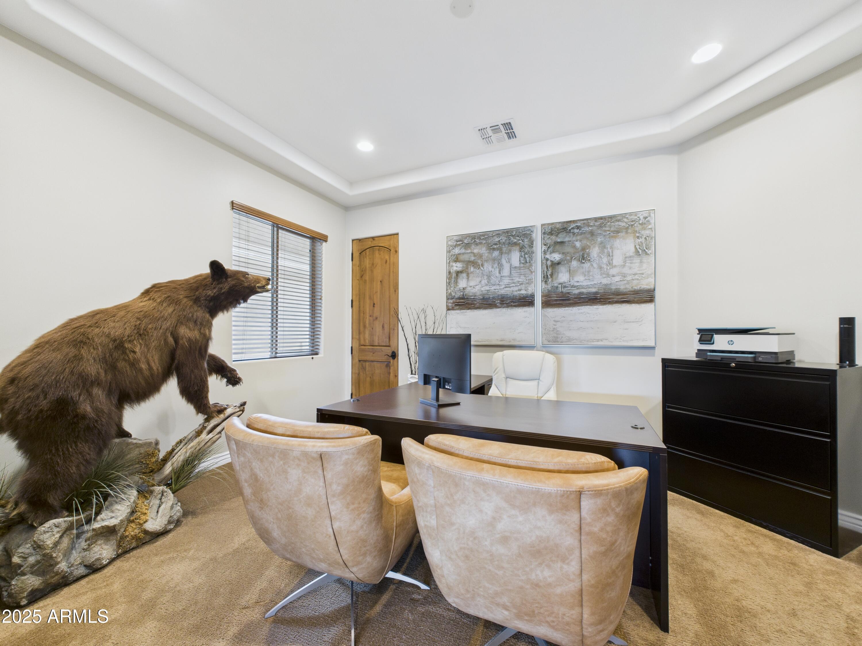 806 West Desert Ranch Road Phoenix, AZ 85086 - Photo 30 of 36 a living room with furniture a window and a table