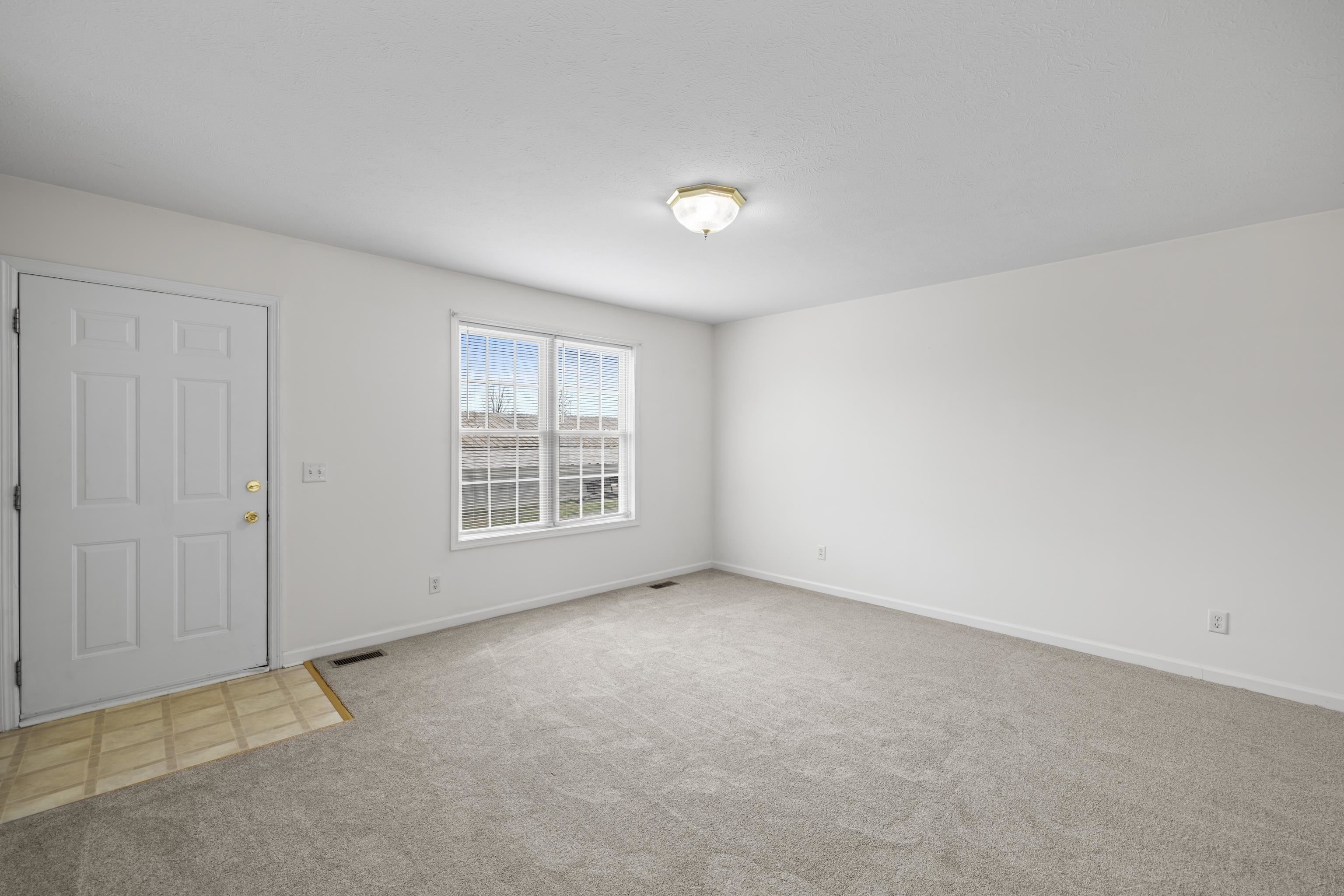 108 Pleasant Hill Road, Unit A & B Harrisonburg, VA 22801 - Photo 11 of 65 an empty room with windows