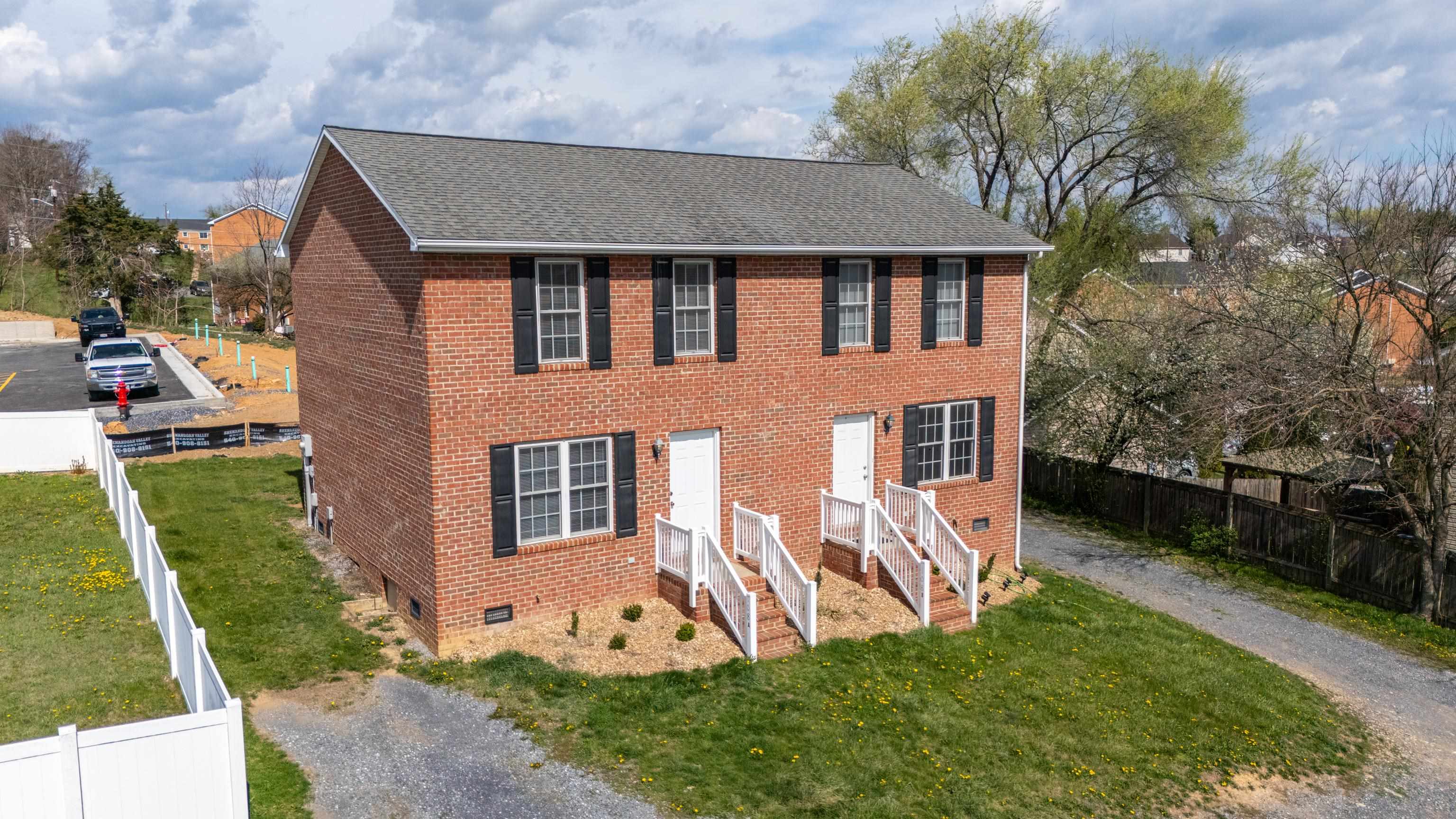 108 Pleasant Hill Road, Unit A & B Harrisonburg, VA 22801 - Photo 2 of 65 a front view of a house with a yard