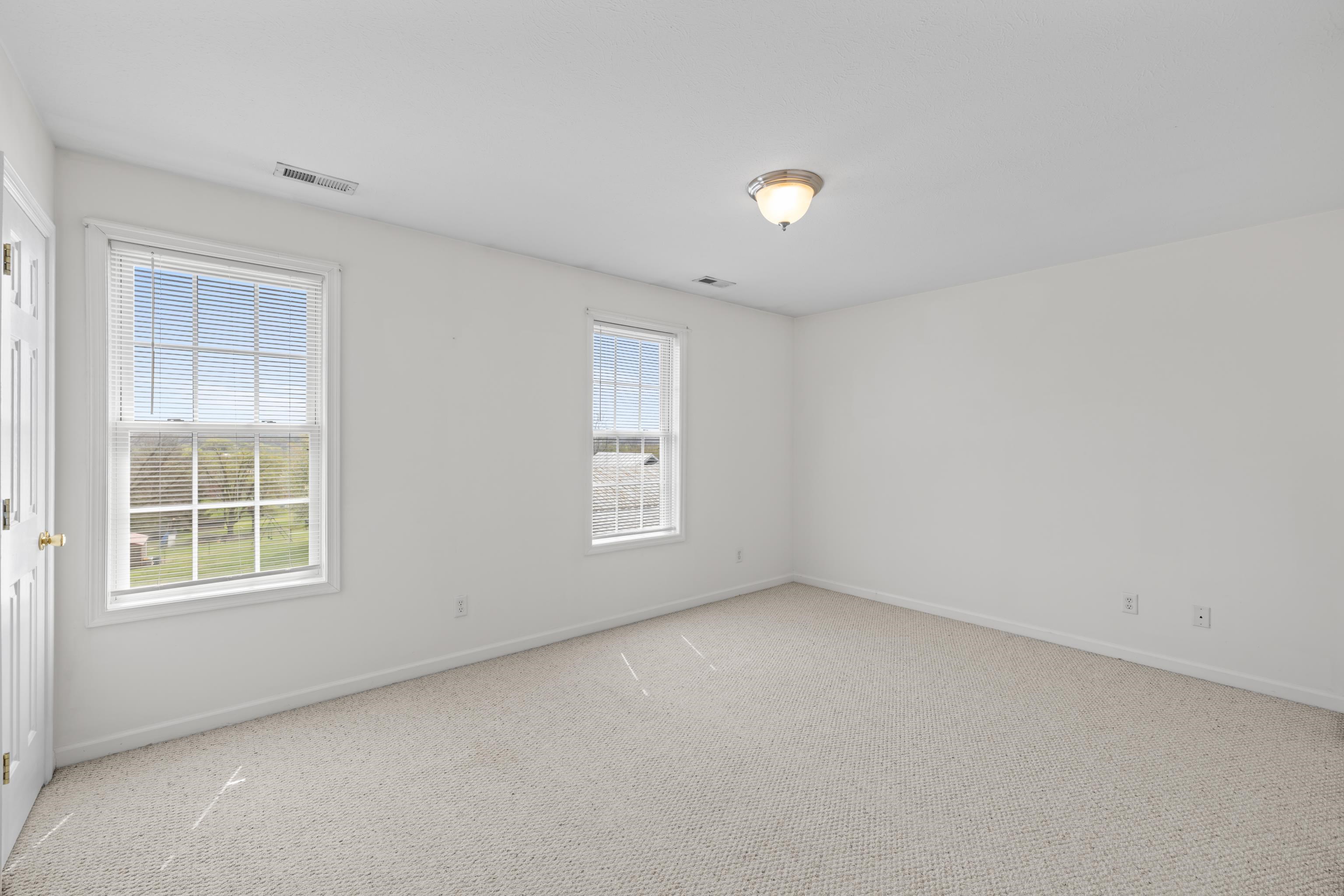 108 Pleasant Hill Road, Unit A & B Harrisonburg, VA 22801 - Photo 28 of 65 an empty room with a window
