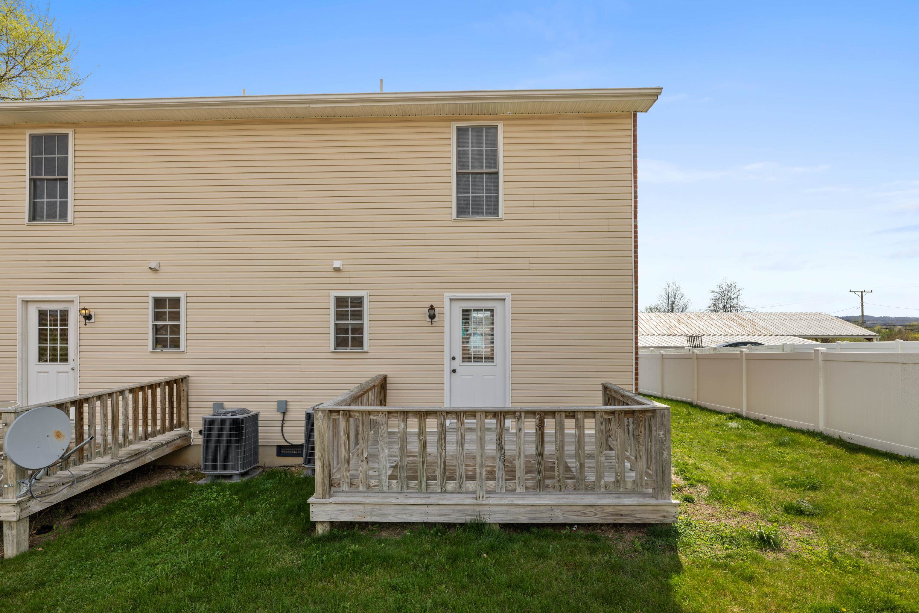 108 Pleasant Hill Road, Unit A & B Harrisonburg, VA 22801 - Photo 44 of 65 a view of a deck with a chair