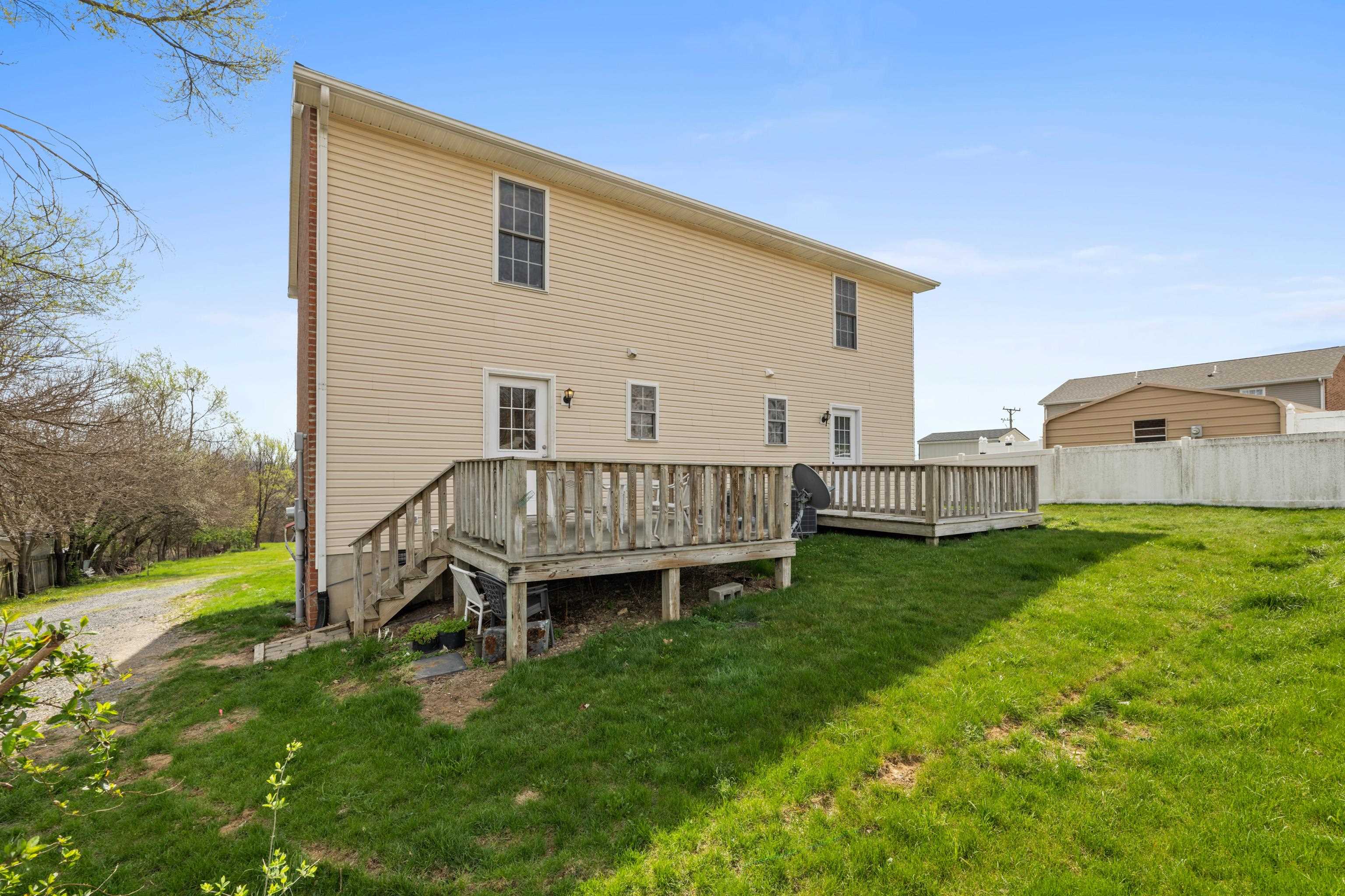 108 Pleasant Hill Road, Unit A & B Harrisonburg, VA 22801 - Photo 46 of 65 a view of a house with a yard and deck