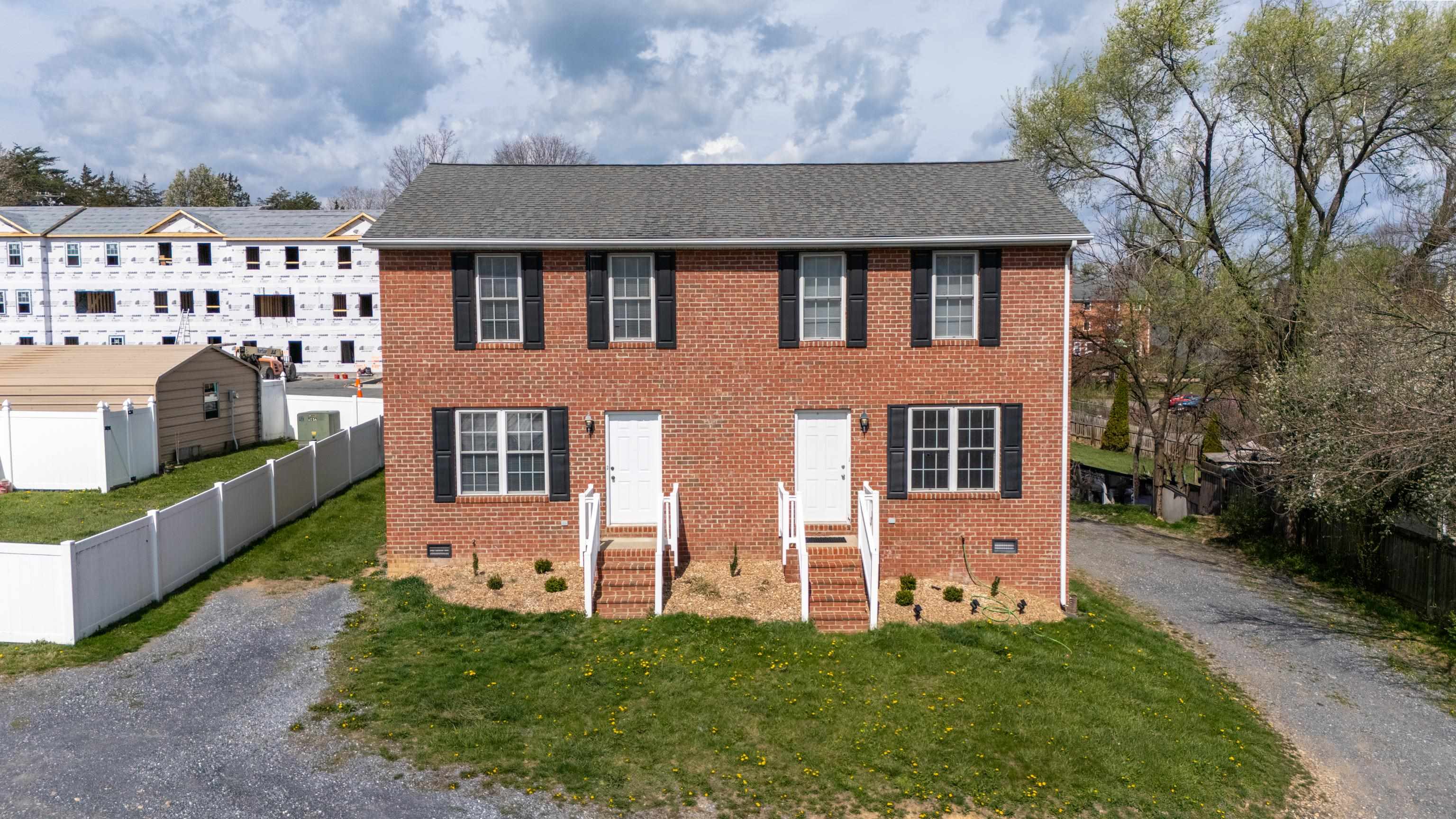 108 Pleasant Hill Road, Unit A & B Harrisonburg, VA 22801 - Photo 47 of 65 a front view of a house with a yard