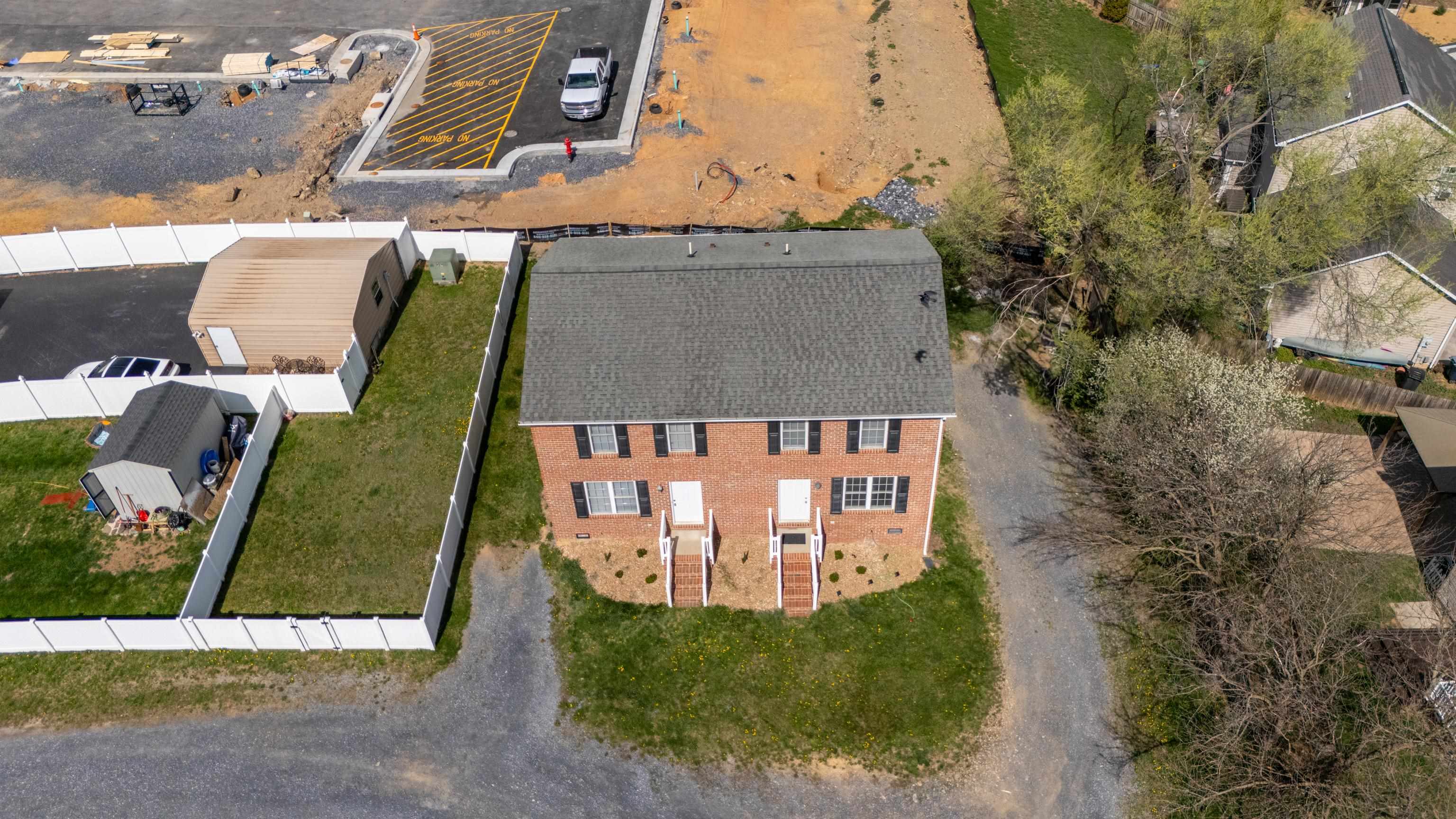 108 Pleasant Hill Road, Unit A & B Harrisonburg, VA 22801 - Photo 52 of 65 an aerial view of a house with a yard basket ball court and outdoor seating