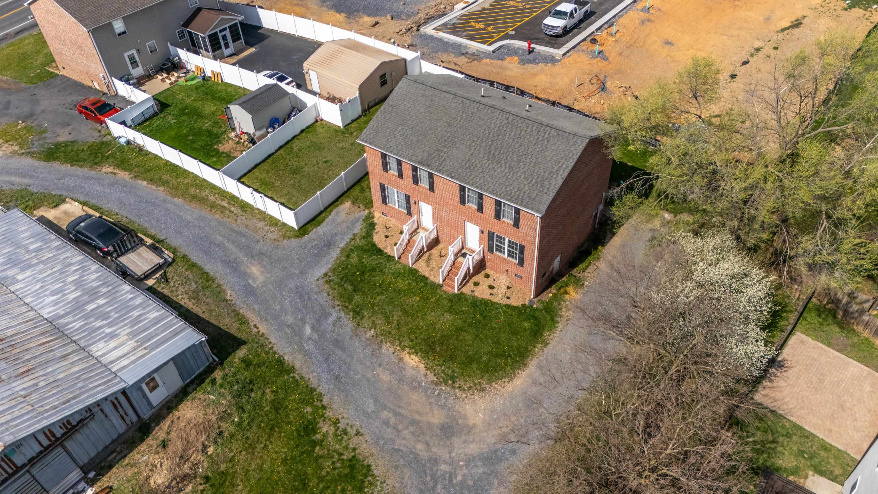 108 Pleasant Hill Road, Unit A & B Harrisonburg, VA 22801 - Photo 53 of 65 an aerial view of a house with a yard