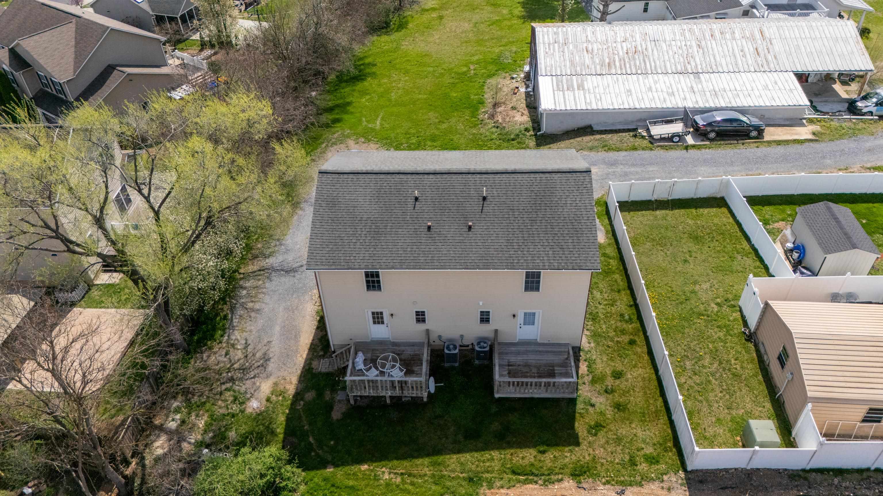108 Pleasant Hill Road, Unit A & B Harrisonburg, VA 22801 - Photo 55 of 65 an aerial view of a house with garden space and sitting area