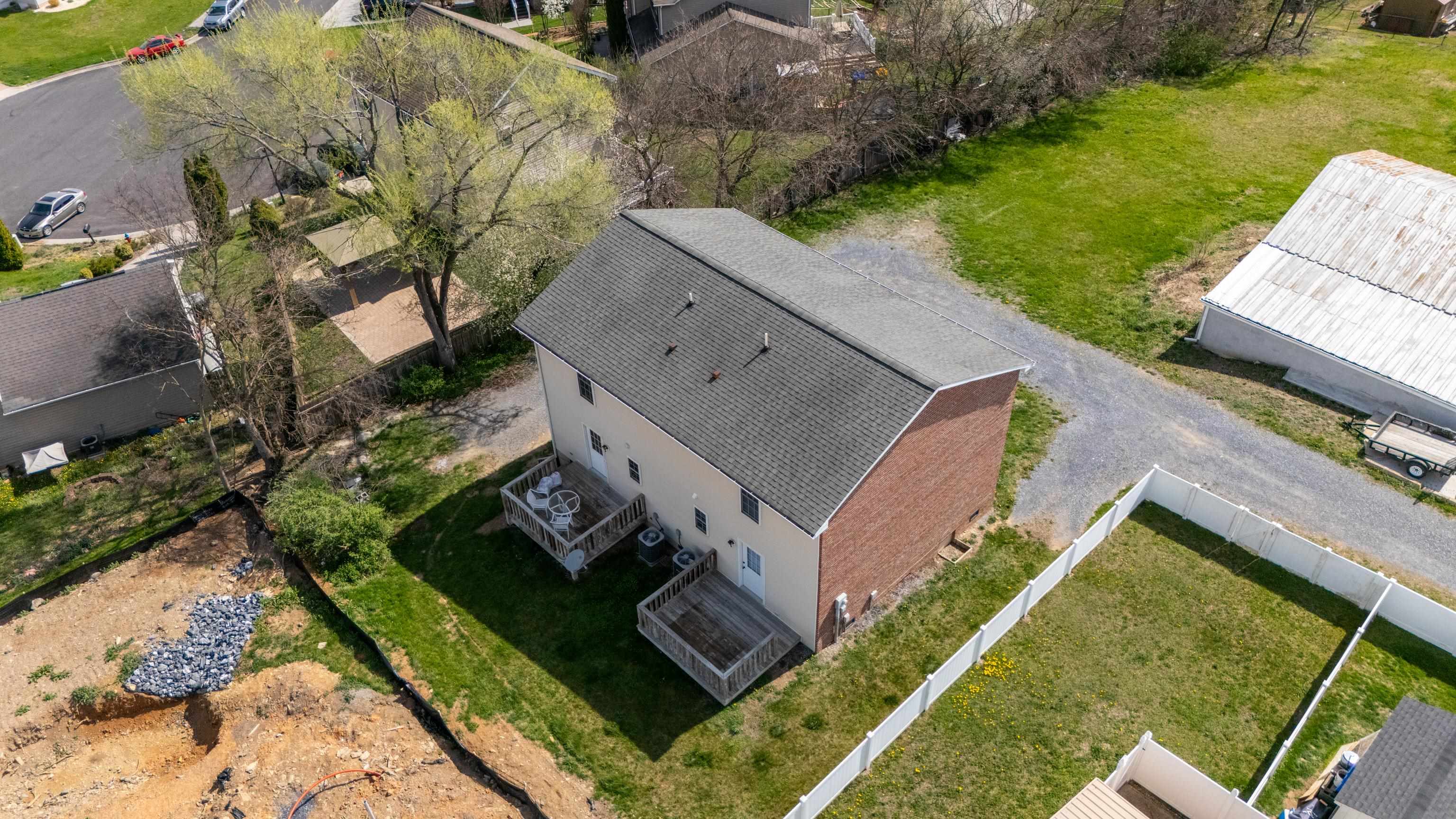 108 Pleasant Hill Road, Unit A & B Harrisonburg, VA 22801 - Photo 56 of 65 an aerial view of a house with a garden