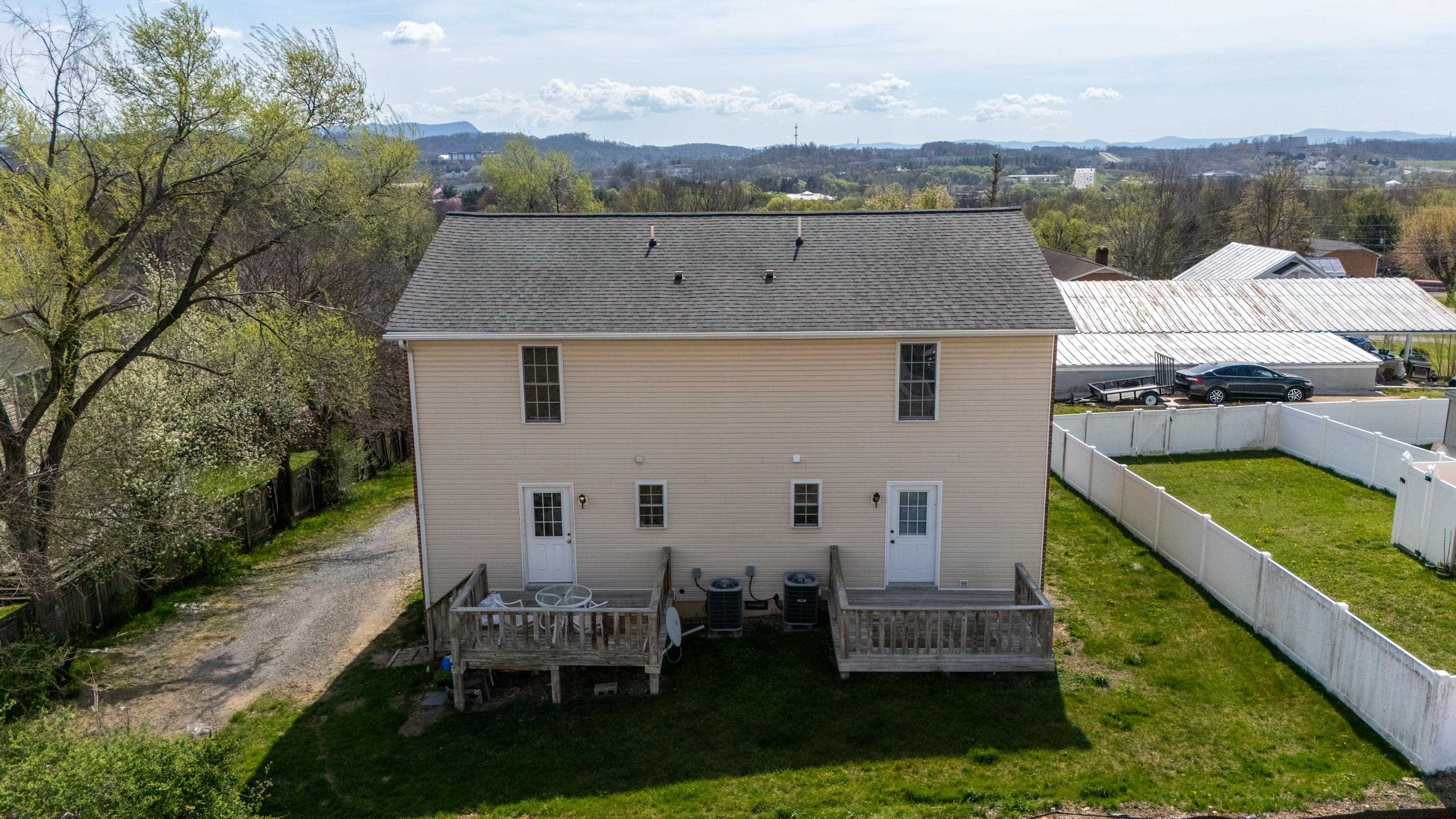 108 Pleasant Hill Road, Unit A & B Harrisonburg, VA 22801 - Photo 58 of 65 an aerial view of a house with a yard